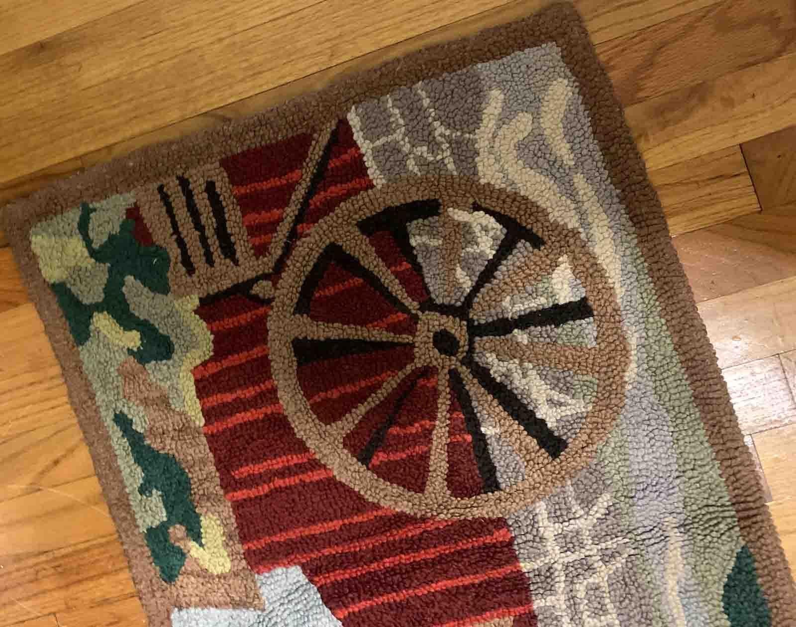 Handmade antique American Hooked rug in colorful shades. The rug is from the beginning of 20th century in original good condition. 

-condition: original good,

-circa: 1930s,

-size: 1.9' x 2.11' (58cm x 90cm),
?
-material: