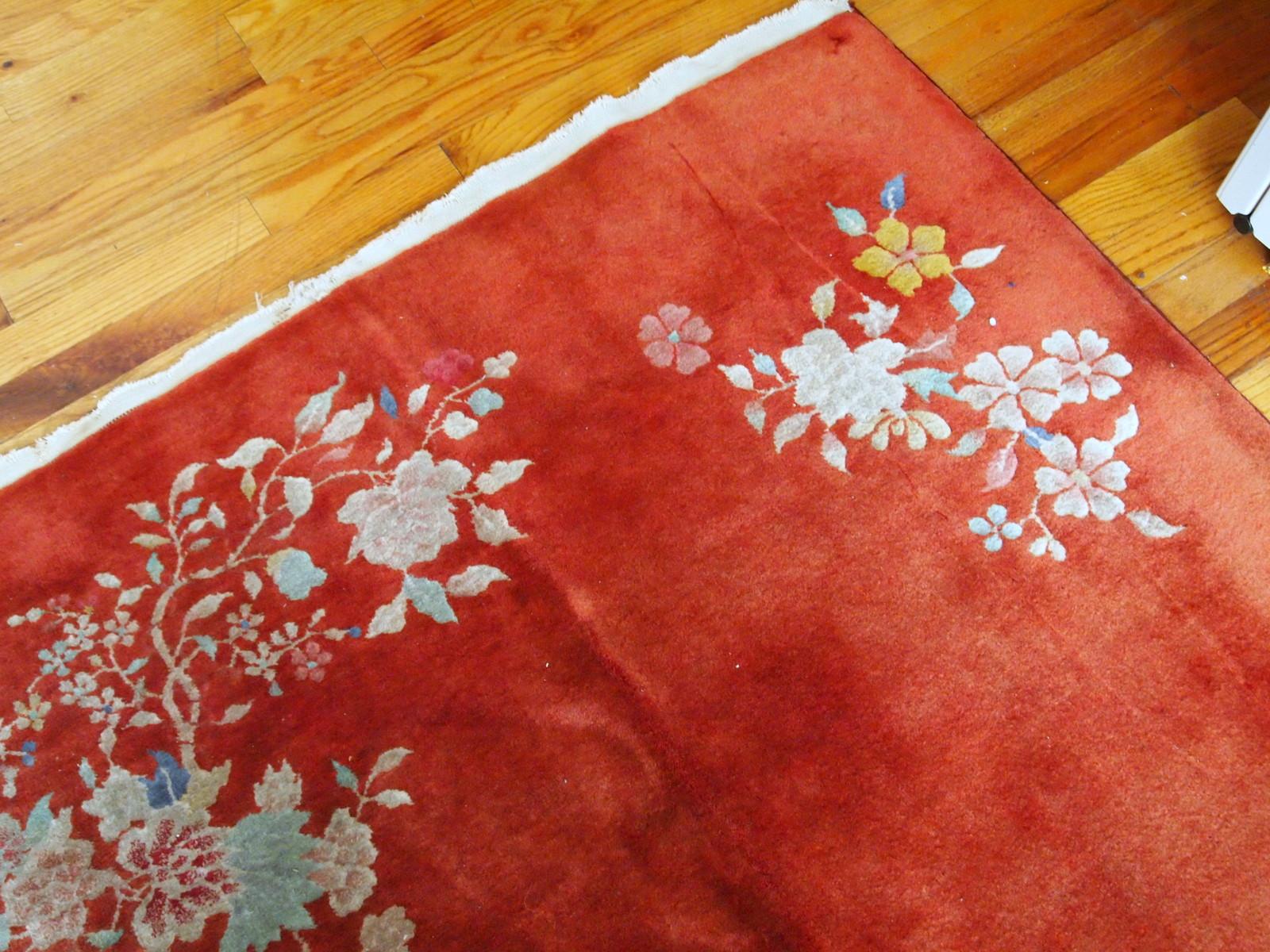Handmade antique Art Deco Chinese rug in bright orange color. The rug is in original good condition, made in the beginning of 20th century.

-condition: original good,

-circa: 1920s,

-size: 4.1' x 6.4' (125cm x 195cm)?,

-material:
