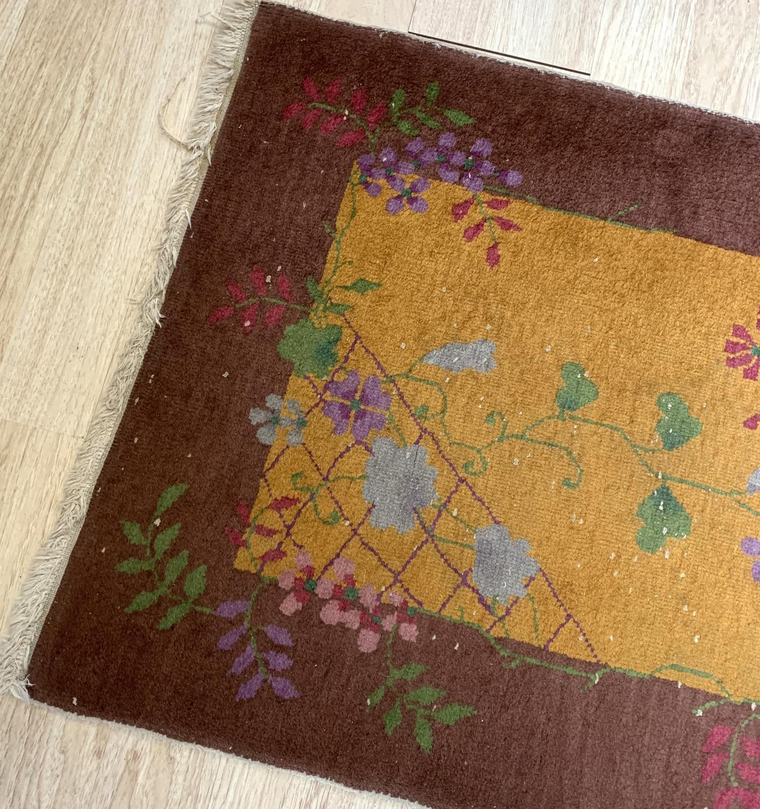 Handmade antique Art Deco Chinese rug in original condition, it has some low pile. The rug is from the beginning of 20th century. 

-condition: original, low pile,

-circa: 1920s,

-size: 2.10' x 5.2' (90cm x 158cm)?,

-material: