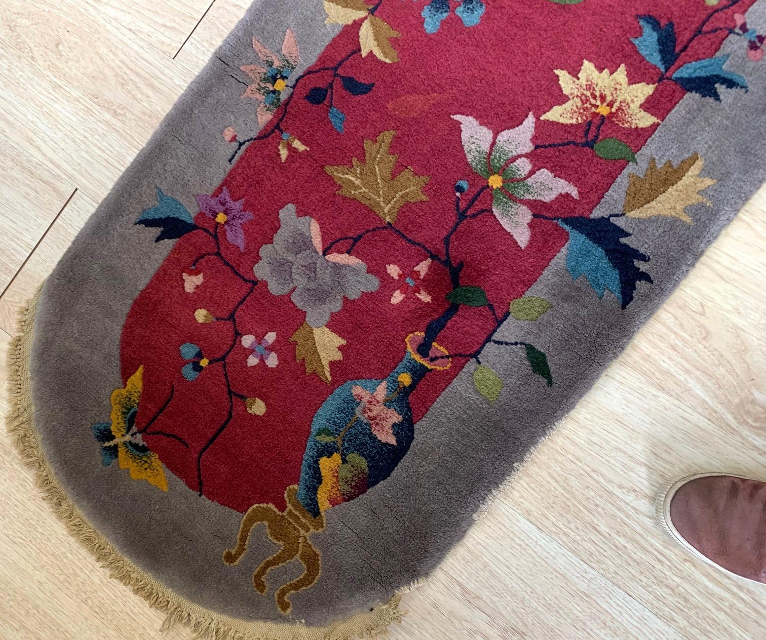 Handmade antique Art Deco Chinese oval rug in original good condition. The rug is from the beginning of 20th century.

-condition: original good,

-circa: 1920s,

-size: 2.1' x 3.10' (64cm x 120cm)?,

-material: wool,

-country of origin: