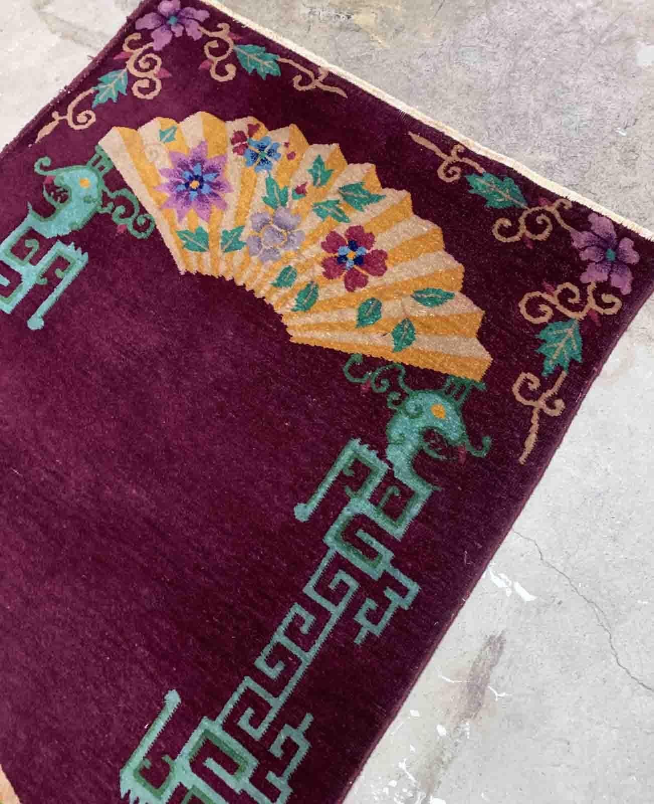 Handmade antique Art Deco Chinese rug in purple shade and very unusual design. The rug is from the beginning of 20th century in original good condition. 

-condition: original good,

-circa: 1920s,

-size: 3.1' x 4.10' (94cm x