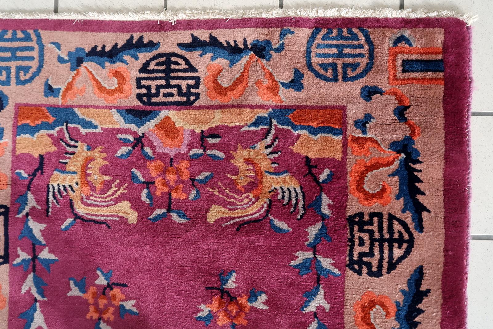 Handmade Antique Art Deco Chinese Rug from the 1920s:

Dimensions:
Size: 3.1’ x 4.5’ (95cm x 138cm)
Shape: Rectangular
Material and Condition:
Crafted from wool, this rug exudes both elegance and durability.
It is in good condition, a testament to