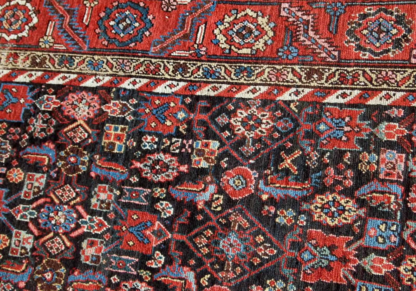 Handmade antique Bakhsaish runner in chocolate brown, red and blue shades. It is from the end of 19th century in good condition.

-condition: origina good,

-circa: 1880s,

-size: 3.2' x 12.3' ( 97cm x 375cm ),

-material: wool,

-country