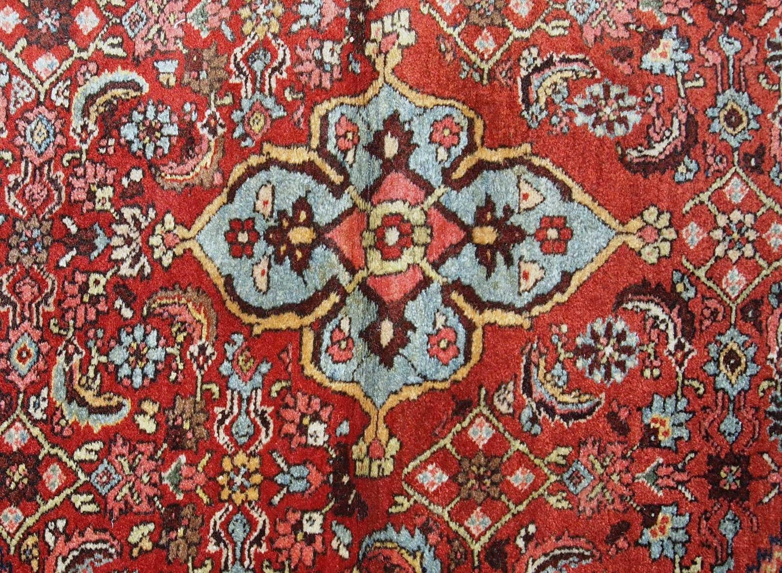 Handmade antique Bidjar rug from the beginning of 20th century. The rug is in original good condition made in red and blue wool.

?-condition: original good,

-circa: 1900s,

-size: 4.5' x 5.6' (137cm x 170cm),

-material: wool,

-country