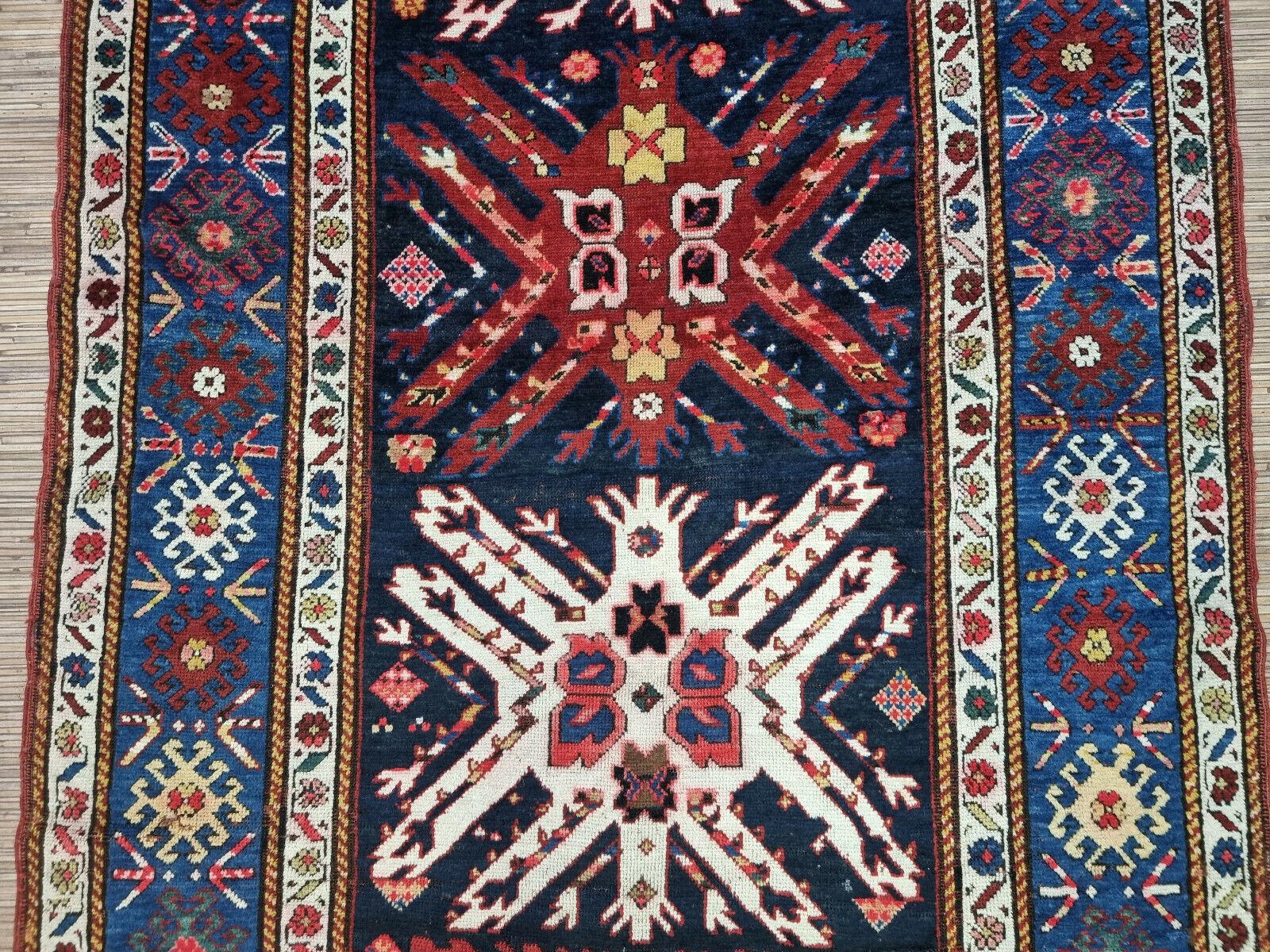 Wool Handmade Antique Caucasian Kazak Rug 4.1' x 8.9', 1900s - 1D104 For Sale