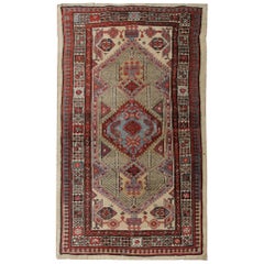 Tapis caucasien ancien fait à la main:: tapis oriental en laine rouge profond et beige pour chambre à coucher