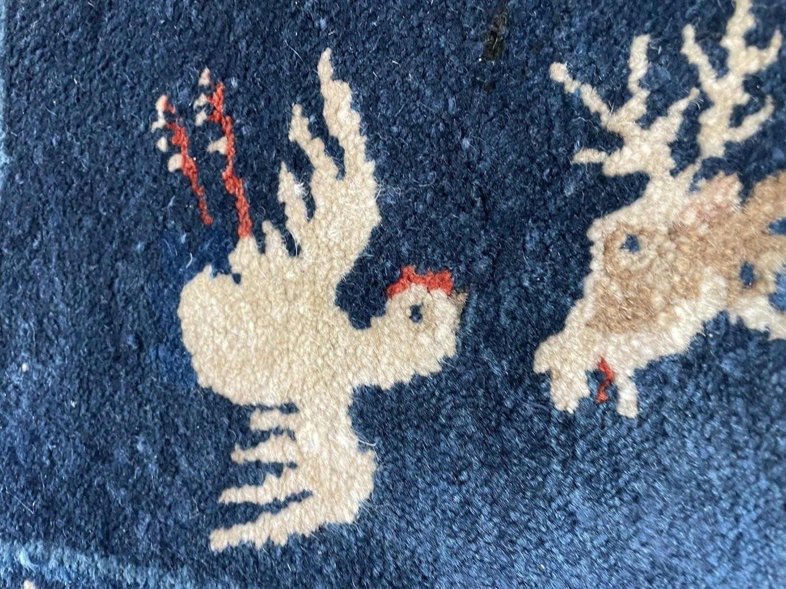 Antique Chinese Pao Tao Wool Rug, 1880s
This is an exceptional antique Chinese Pao Tao rug, dating back to the 1880s. This piece is a rare find, featuring a unique and whimsical design that showcases the artistry of traditional Chinese weaving.