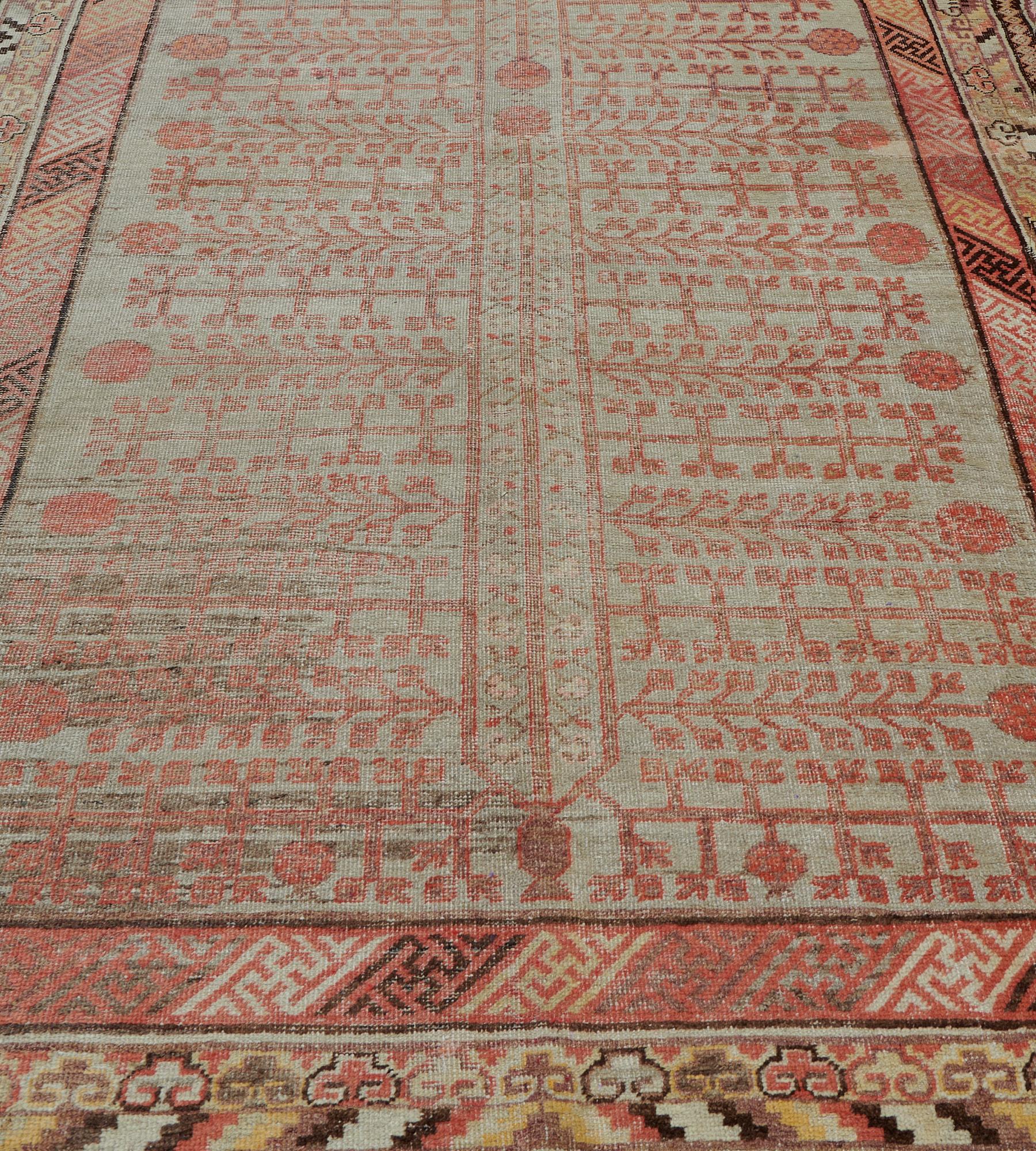 East Turkestani Handmade Antique Circa-1880s Wool Pomegranate Khotan Rug  For Sale