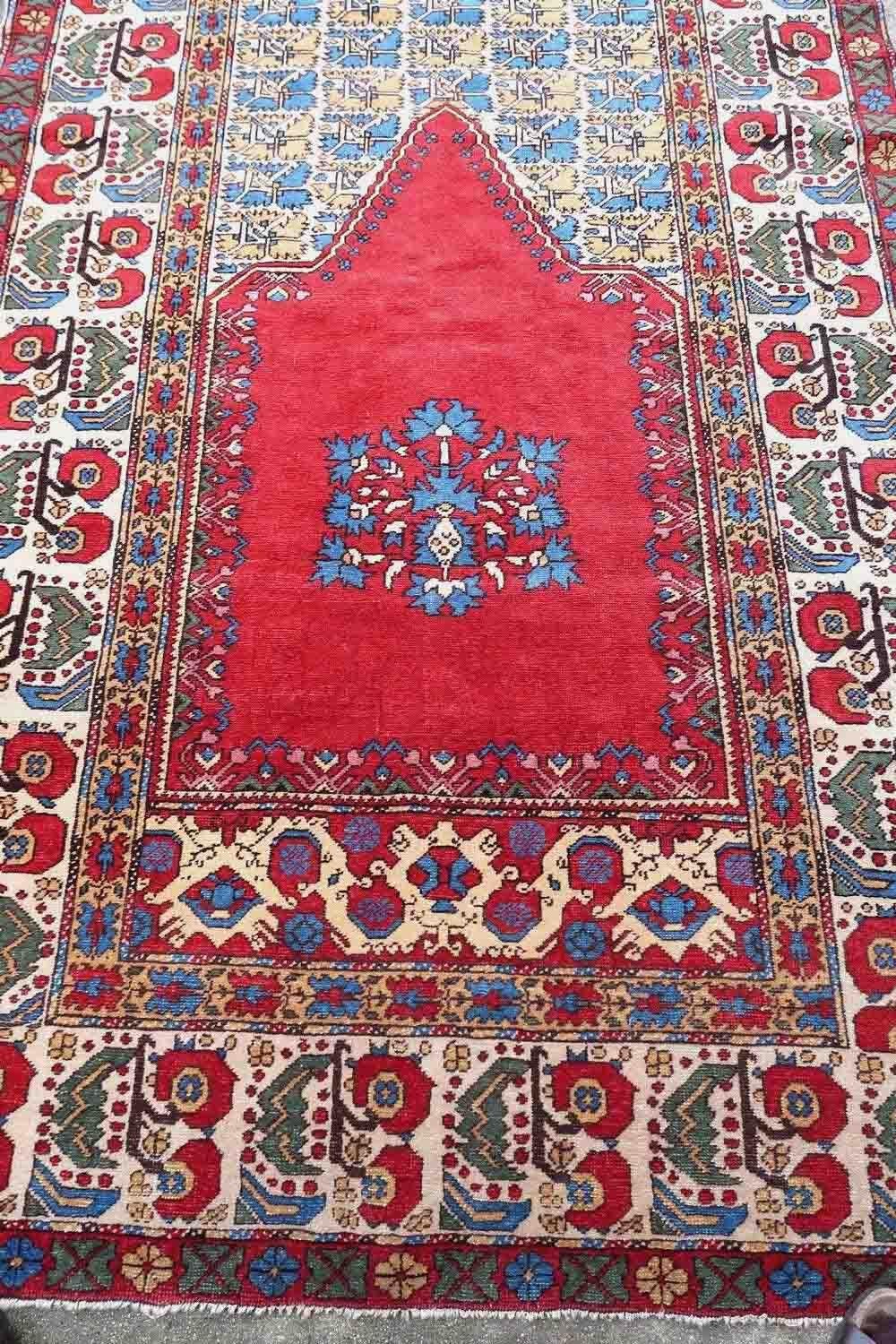 Handmade antique Turkish Transylvania prayer rug in bright natural dyes. The rug is from the end of 19th century in original good condition.

-condition: original good,

-circa: 1880s,

-size: 4.4' x 7.7' (135cm x 236cm),

-material: