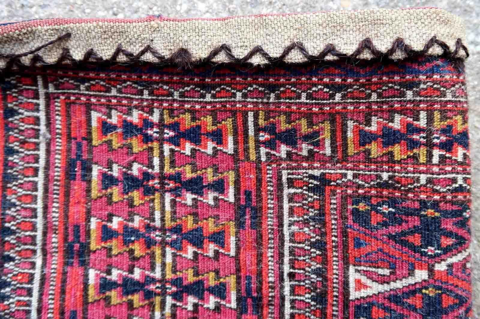 Handmade antique Turkmen Tekke Torba in classic design. This collectible rug is from the beginning of 20th century in original good condition.

-condition: original good,

-circa: 1930s,

-size: 1' x 4.1' (32cm x 127cm),

-material: