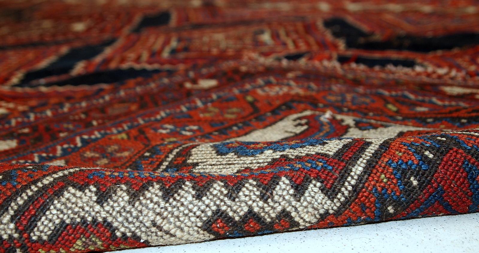 Antique Shiraz rug in distressed condition. The rug made in traditional tribal design in the beginning of 20th century.
?
-condition: distressed,

-circa 1900s,

-size: 4.9' x 11.2' (152cm x 342cm),

-material: wool,

-country of origin: