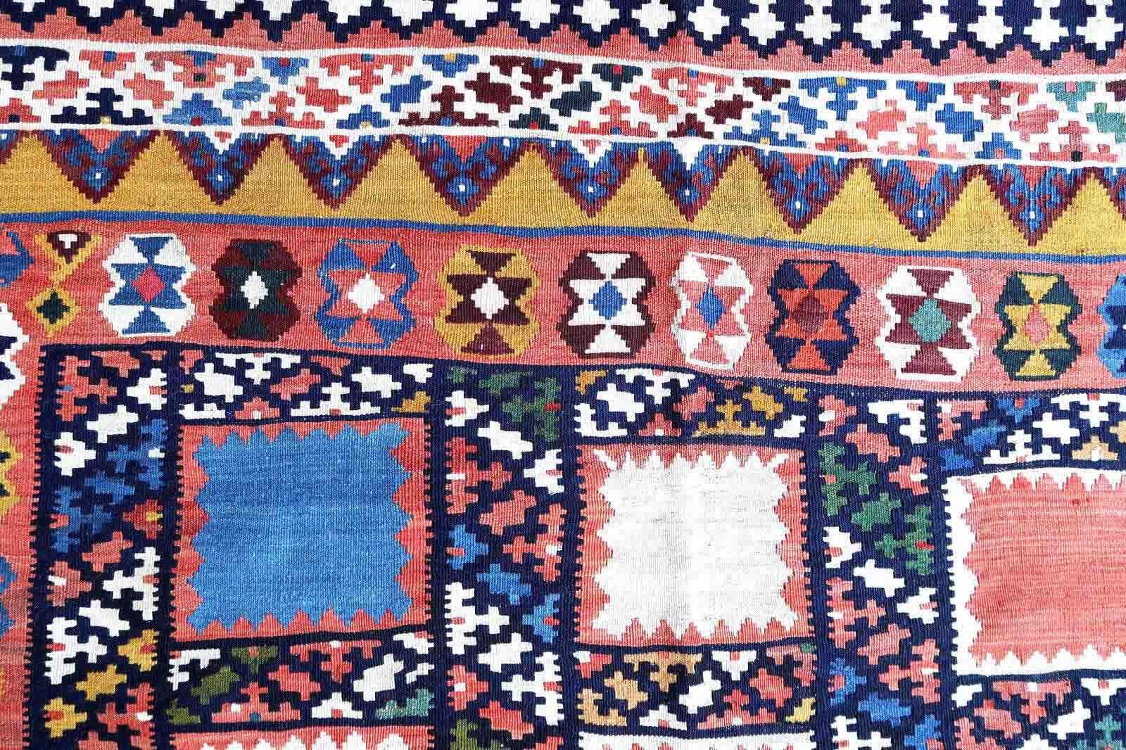 Handmade antique kilim from Gashkai region in geometric design. This flatweave is in original good condition, it is from the beginning of 20th century.

-condition: original good,

-circa: 1920s,

-size: 5.2' x 9.1' (160cm x