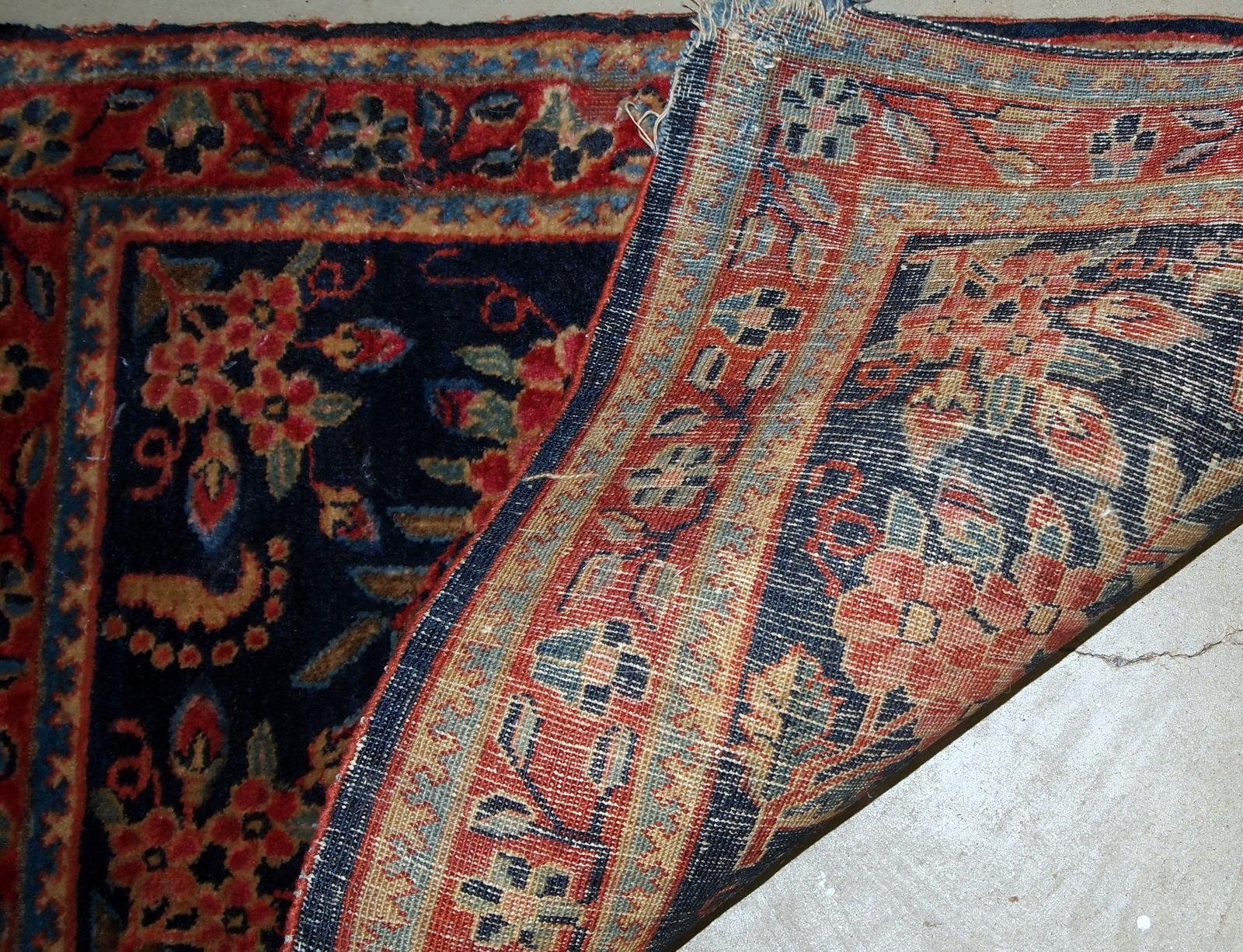 Handmade antique Hamadan style rug in original condition, the corners has some age signs. The rug is from the beginning of 20th century.

-Condition: Original, some signs of age on the corners,

-circa 1920s,

-Size: 2.1' x 3.2' (64 cm x 97