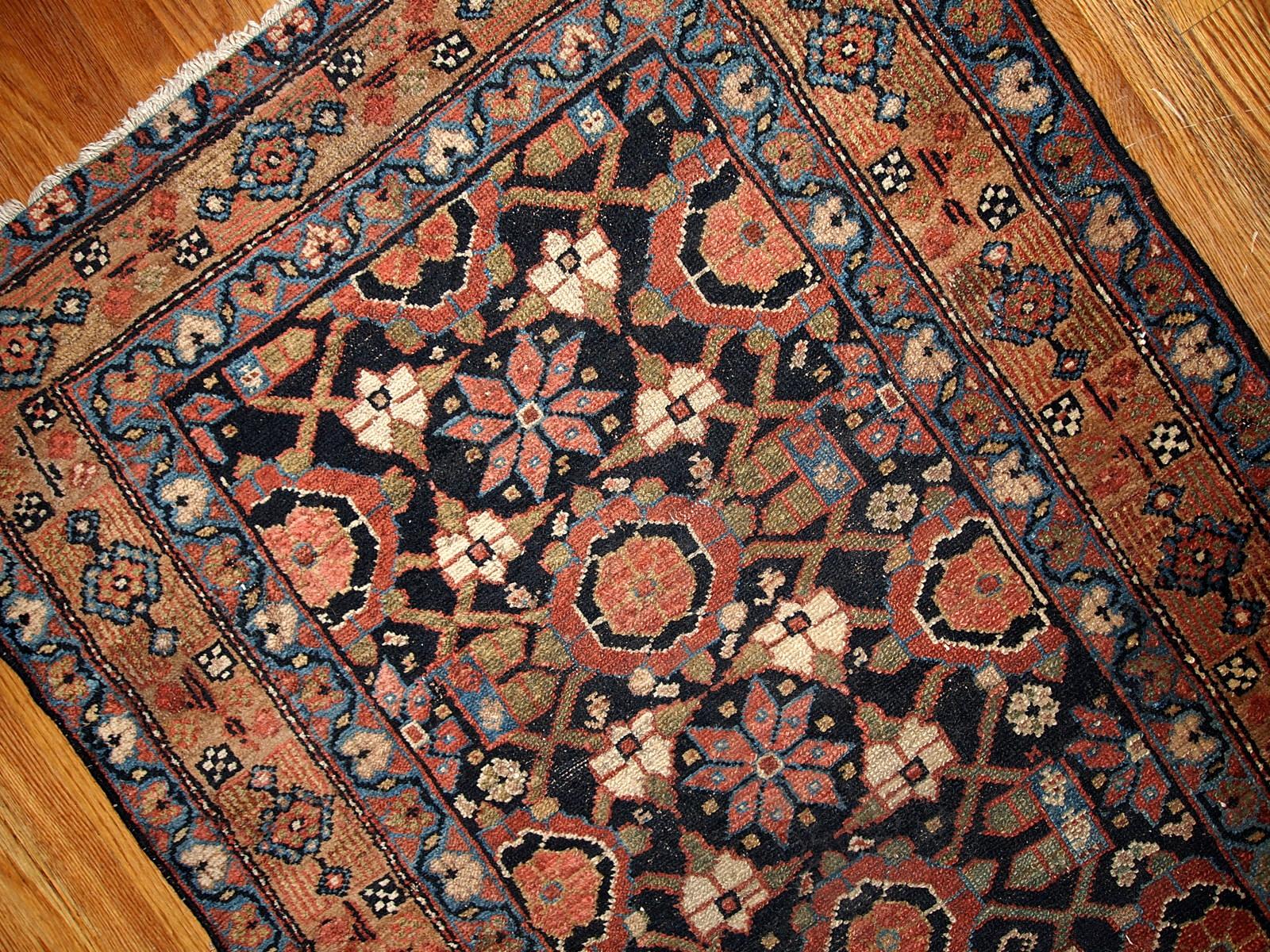 Antique Hamadan style runner 3' x 13' (91cm x 396cm) in good original condition. This rug is in black and red shades.