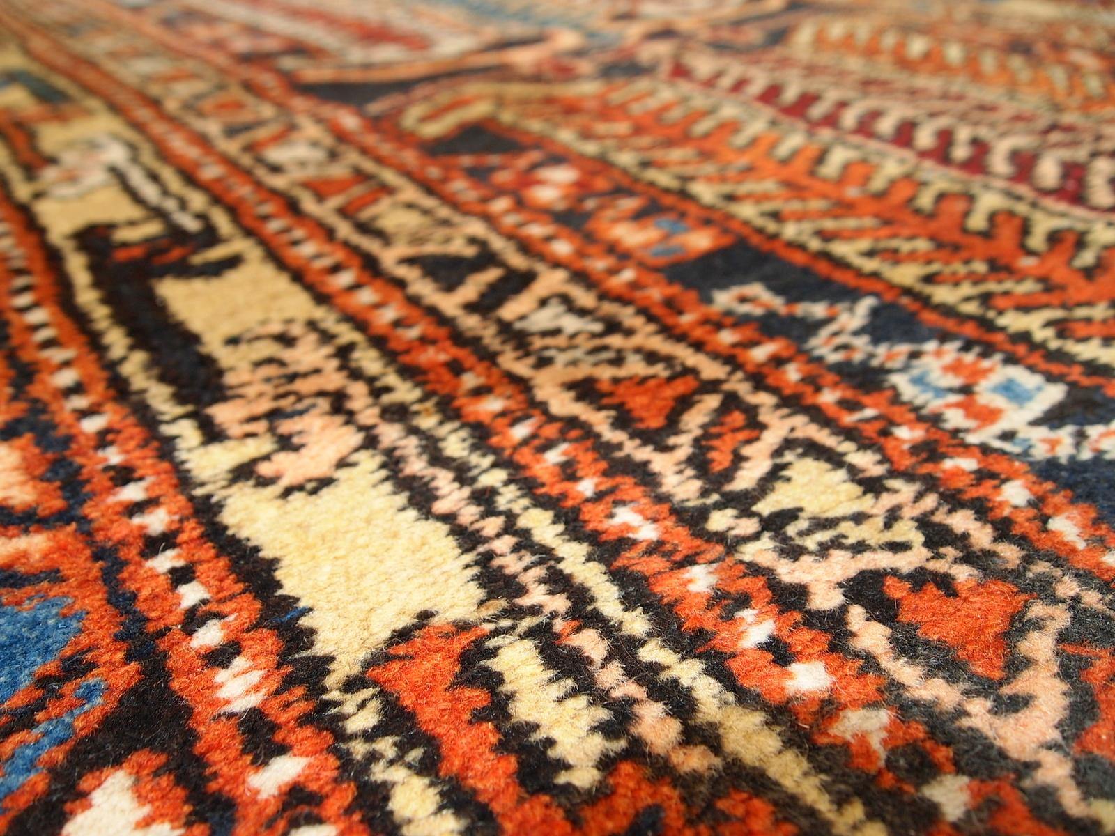 Antique handmade Heriz runner in original good condition. The design of the runner is mixed between geometric and tribal. It has full pile, no stains or holes, great original condition.

 