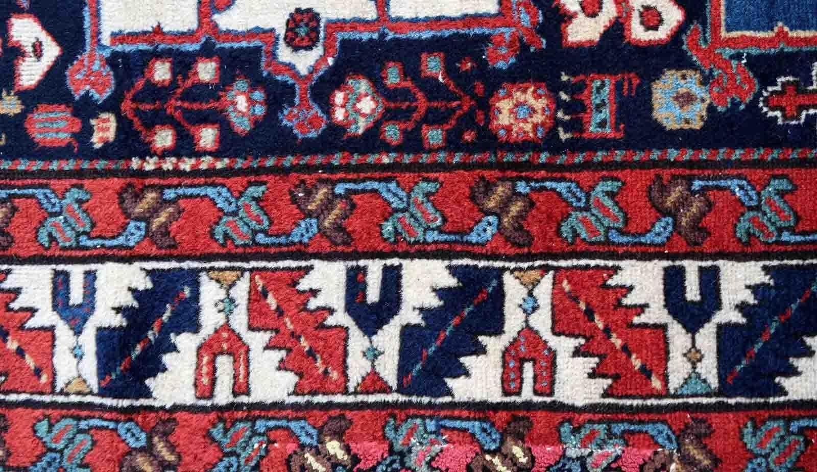 Handmade antique Karajeh rug in bright colors. This collectible rug is from the middle of 19th century in original condition, it has some old restorations.

-condition: good, some old restorations,

-circa: 1850s,

-size: 3.6' x 9.2' (110cm x