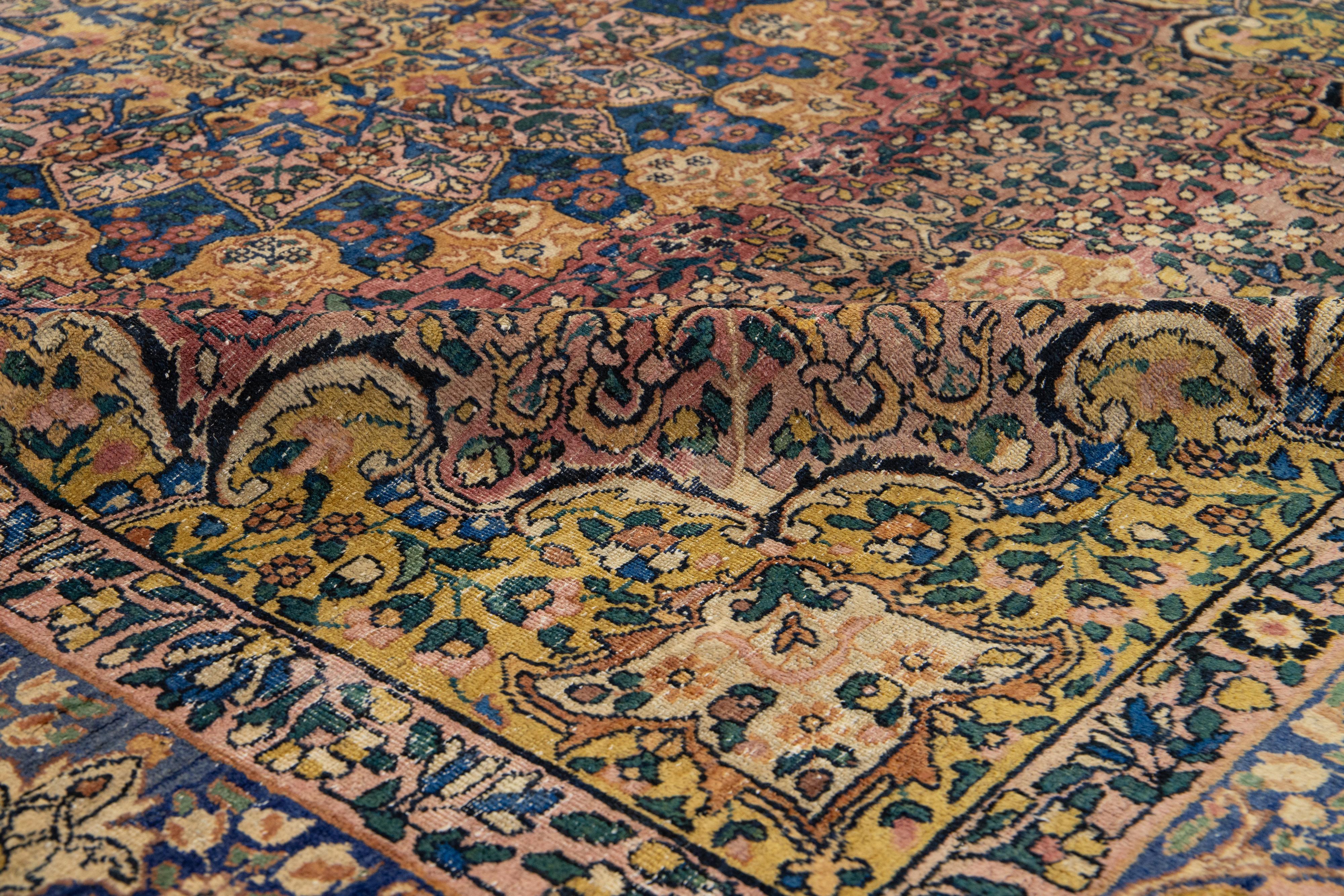 Tapis persan ancien Kerman fait à la main avec un motif de rosettes multicolore en vente 2