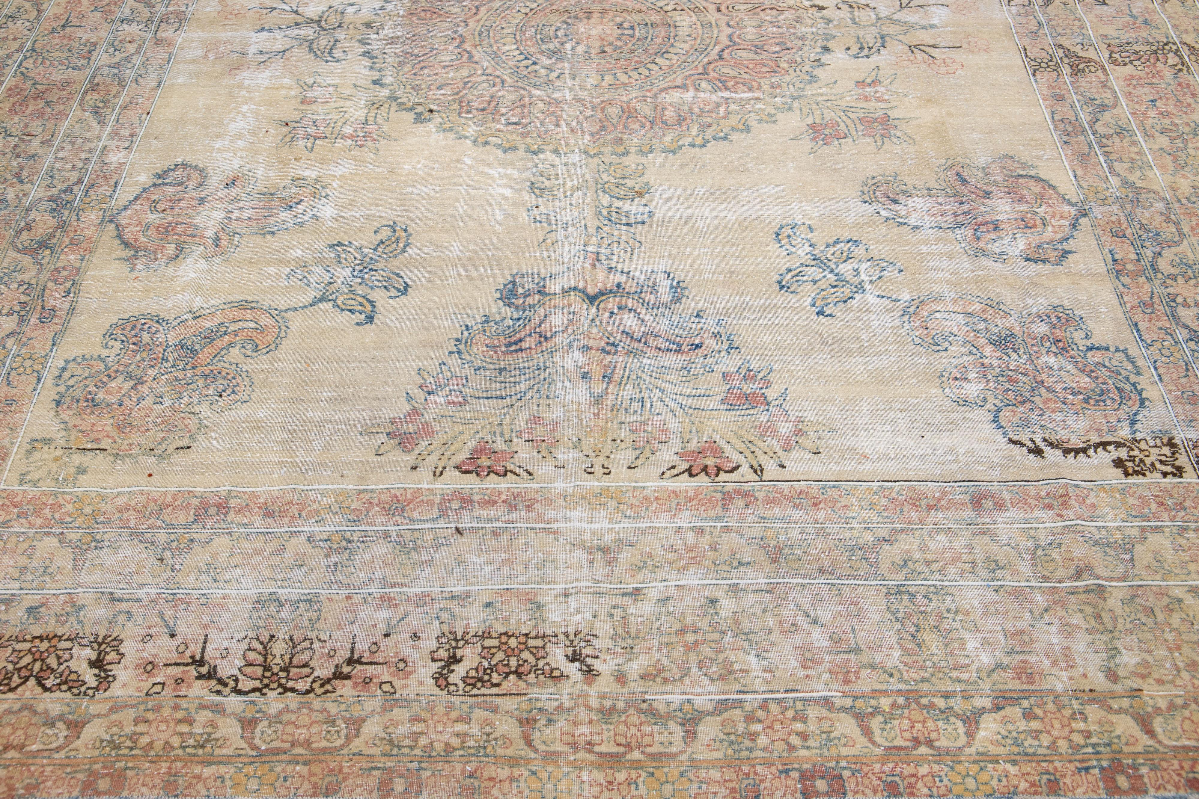 Handmade Antique Kerman Persian Wool Rug with Tan Field In Good Condition For Sale In Norwalk, CT