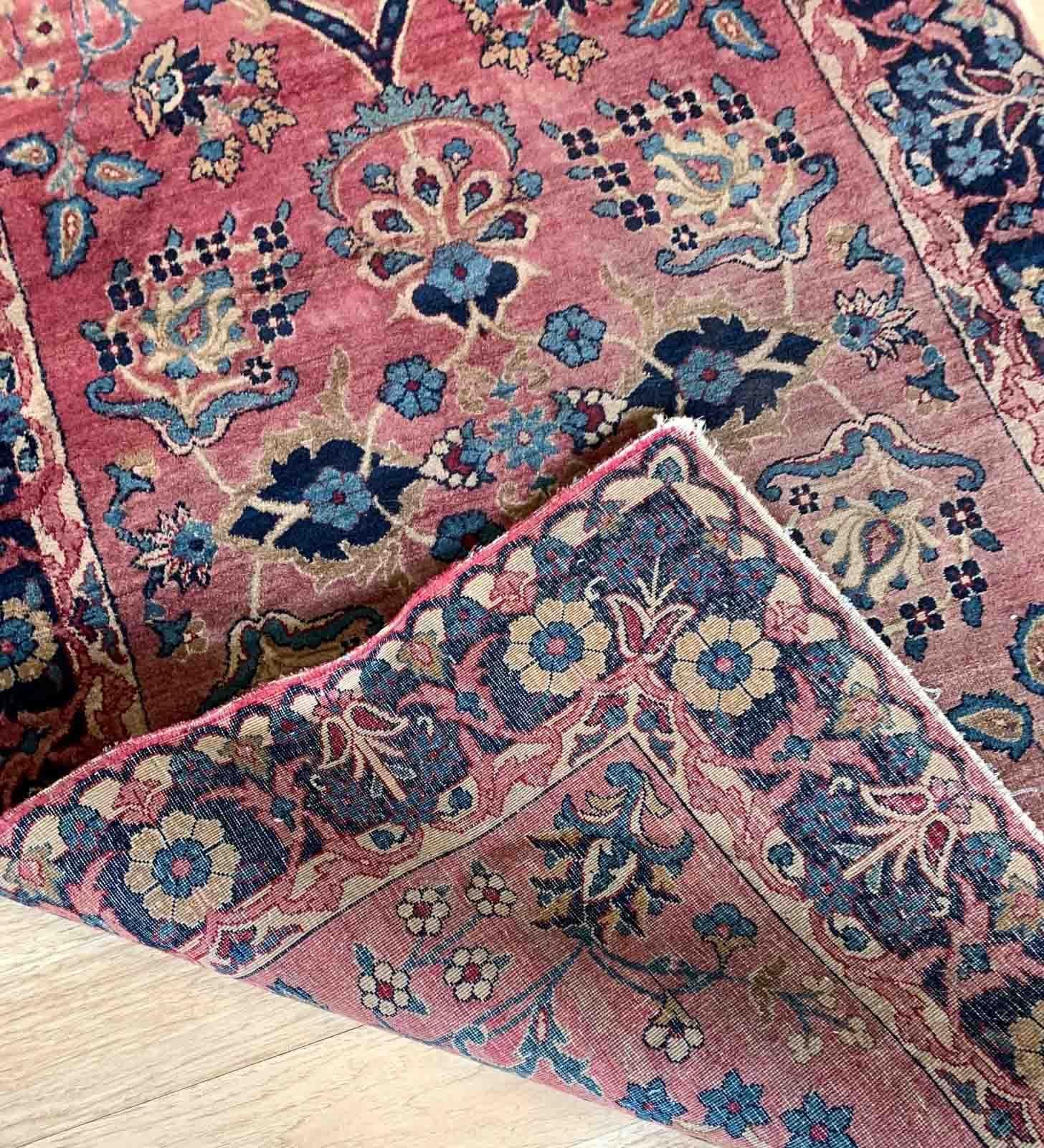 Handmade antique Middle Eastern rug in red and blue shades. The rug is from the beginning of 20th century in original good condition.

-condition: original good,

-circa: 1900s,

-size: 3.2' x 4.10' (97cm x 151cm),
?
-material: