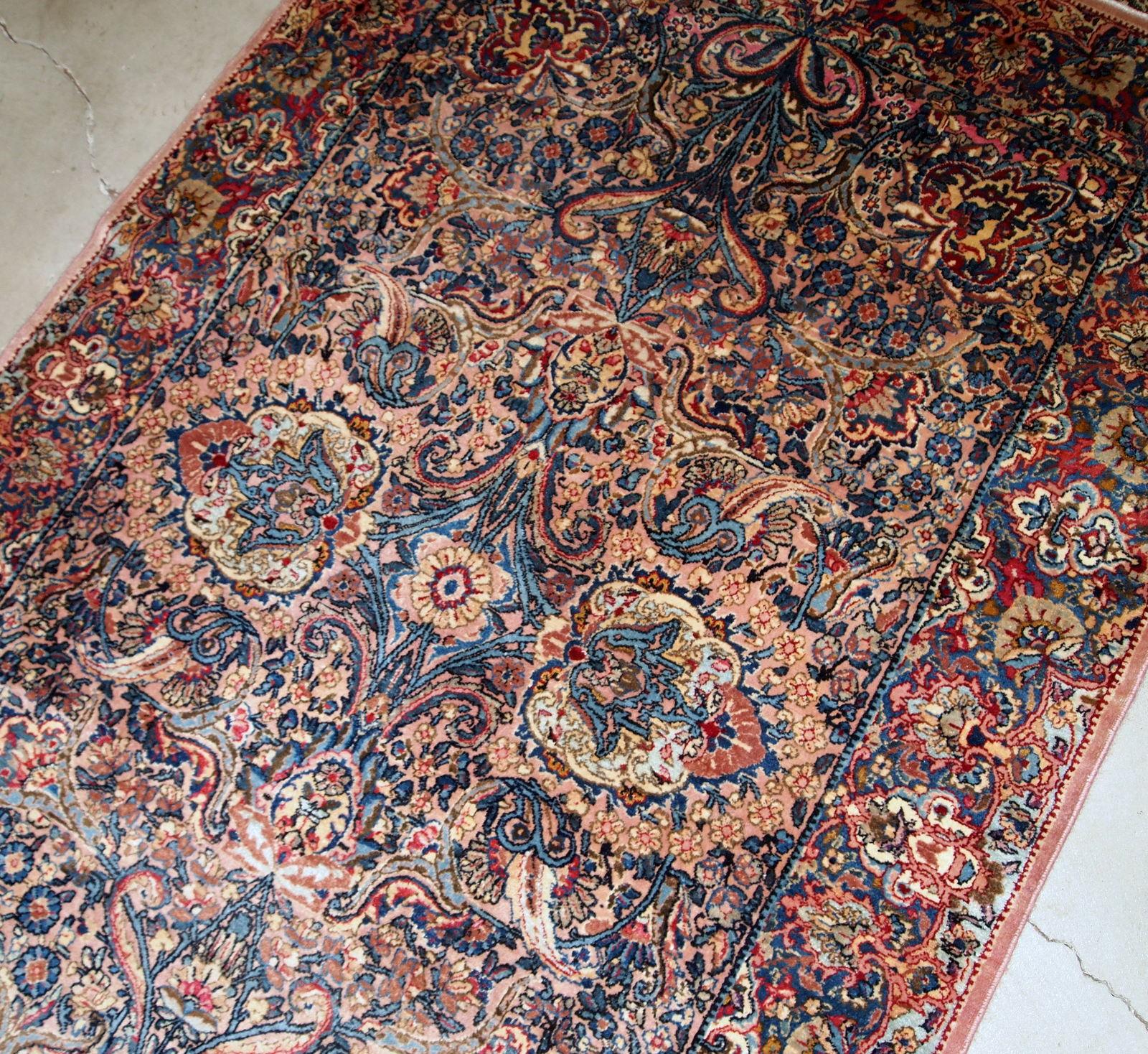Hand made antique Kerman style rug in original good condition. The rug made in the beginning of 20th century in wool.

-condition: original good,

-circa: 1920s,

-size: 4.2' x 6.10' (128cm x 211cm),

-material: wool,

-country of origin: