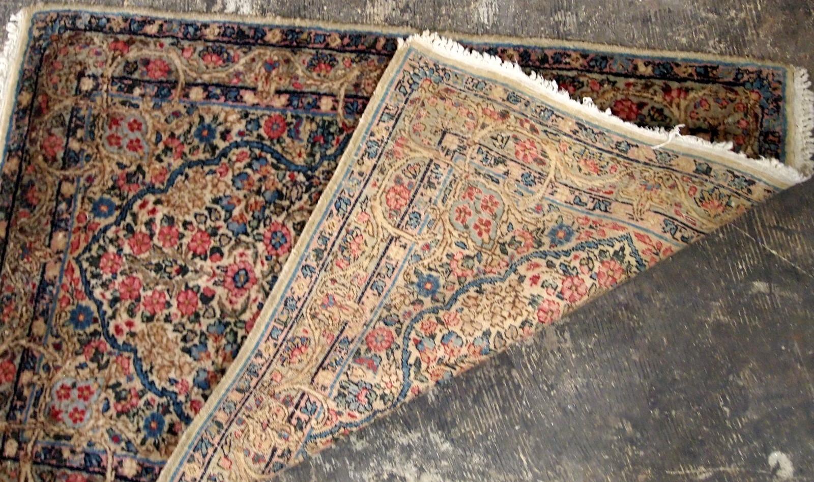 Antique Kerman style floral rug in colorful shades. The rug is from the beginning of 20th century in original good condition.

 