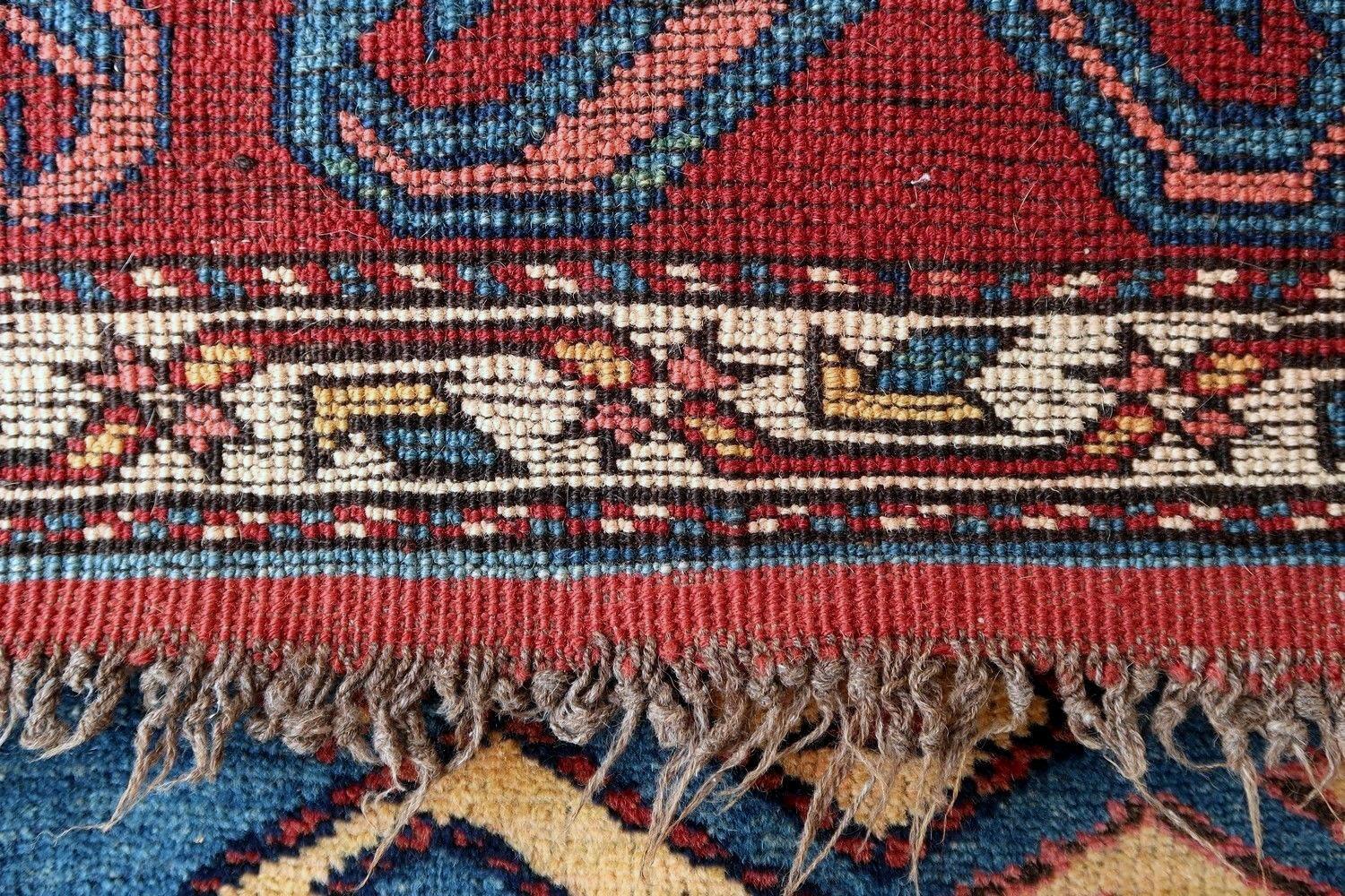Antique Kurdish runner from Middle East in colorful shades. The rug is from the end of 19th century in original good condition.

-condition: original good,

-circa: 1880s,

-size: 2.6' x 9.6' (80cm x 292cm),

-material: wool,

-country of