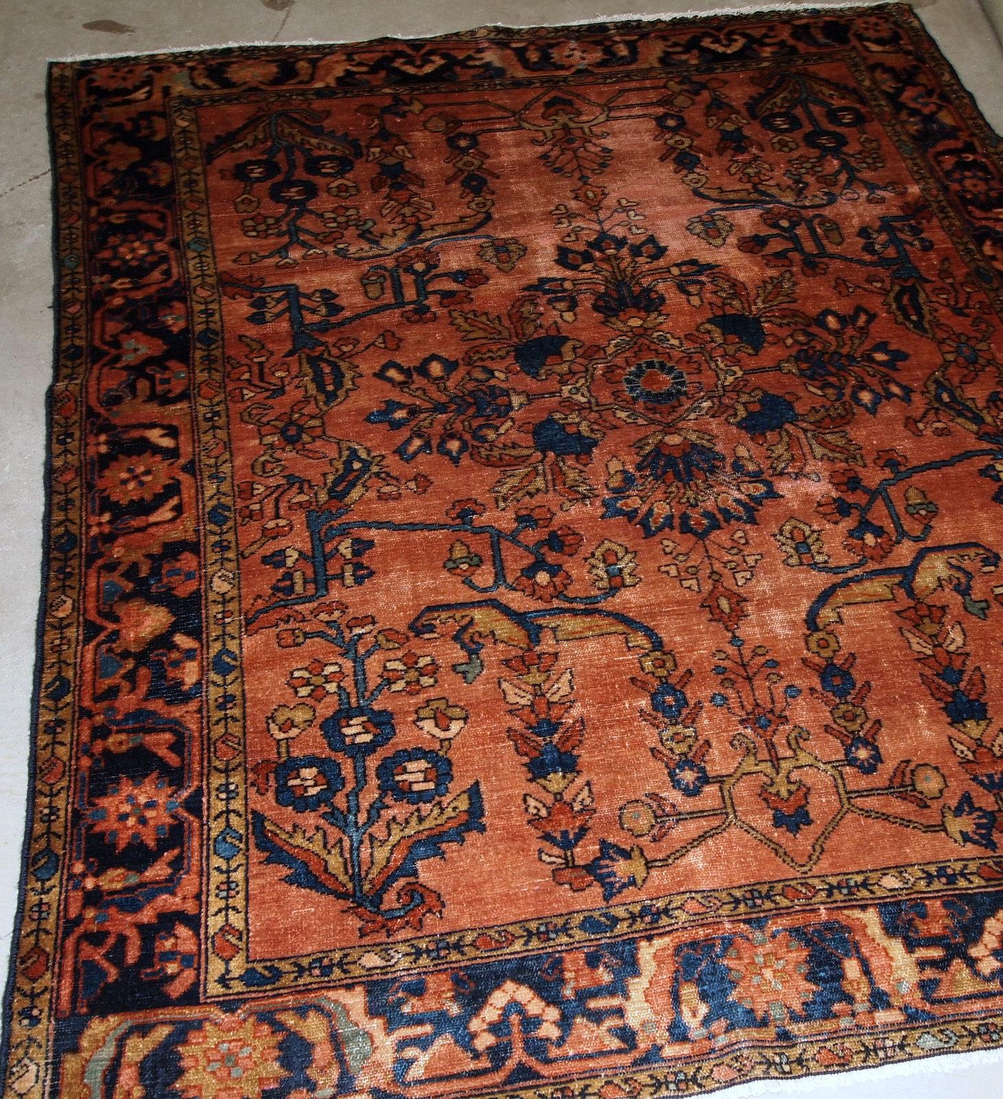 Antique handwoven Lilihan rug from Middle East in red wool. The rug is from the beginning of 20th century, in original condition, it has some low pile.

- Condition: original, some low pile,

- circa 1910s

- Size: 5.3' x 6.9' (161cm x