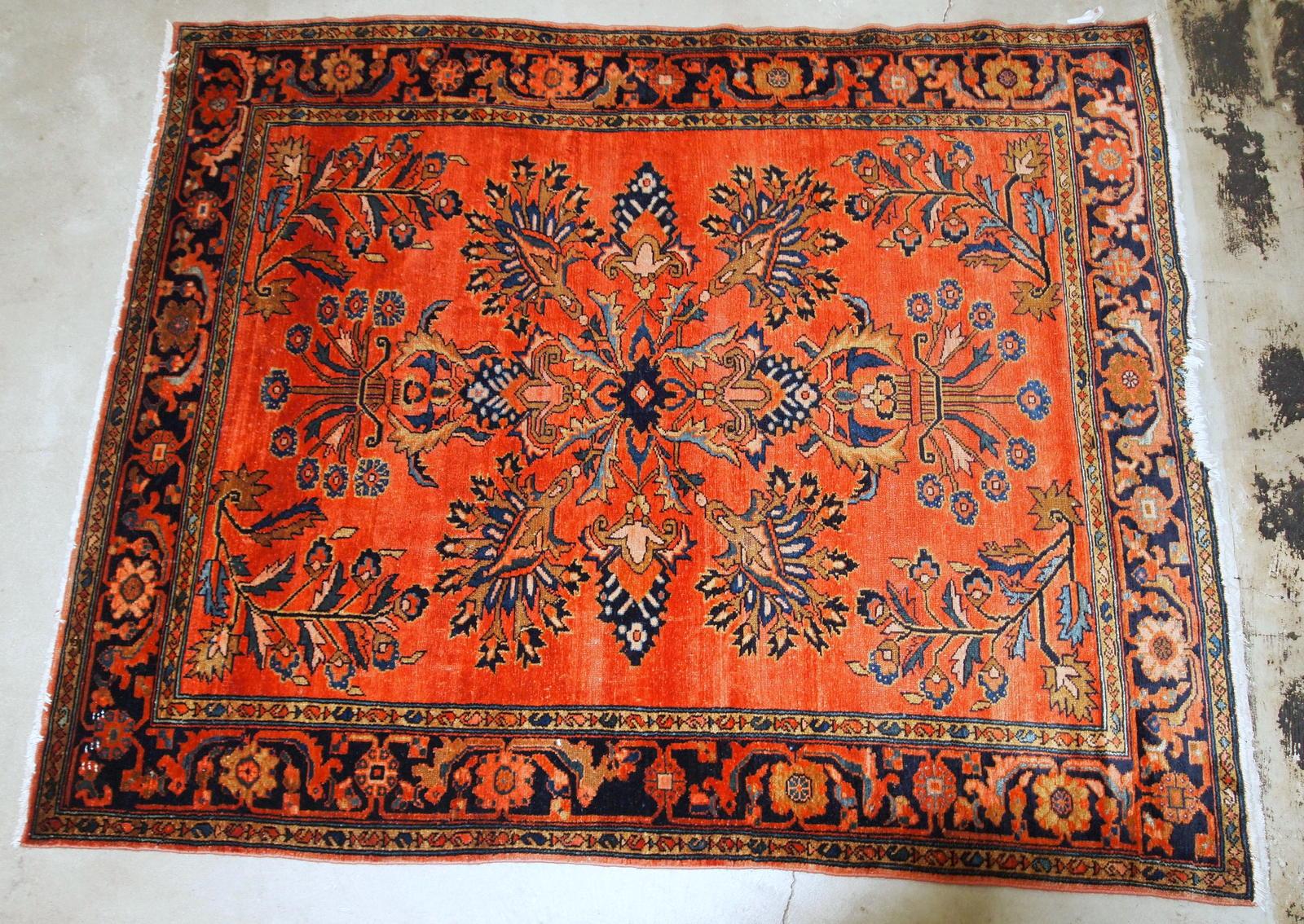 Antique hand woven Lilihan rug in red colour. The rug is from the beginning of 20th century in original condition, has a little damage on one end.

-condition: original, one end is damaged,

-circa: 1920s,

-size: 5.2 x 7.5' (158cm x