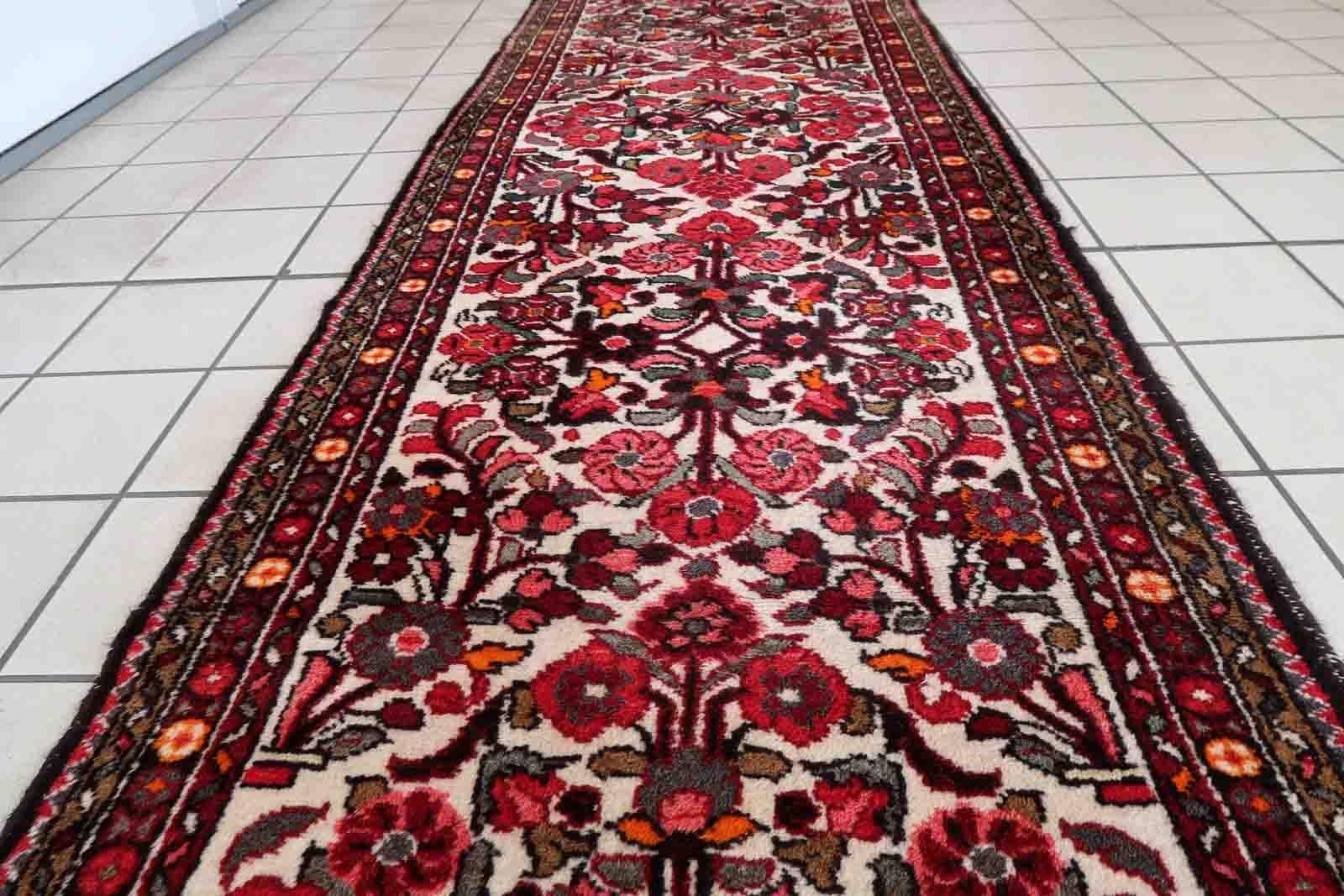 Handmade antique Malayer runner in floral design. The runner is from the beginning of 20th century in original good condition.

-condition: original good,

-circa: 1930s,

-size: 2.8' x 8.8' (87cm x 270cm),

-material: wool,

-country of