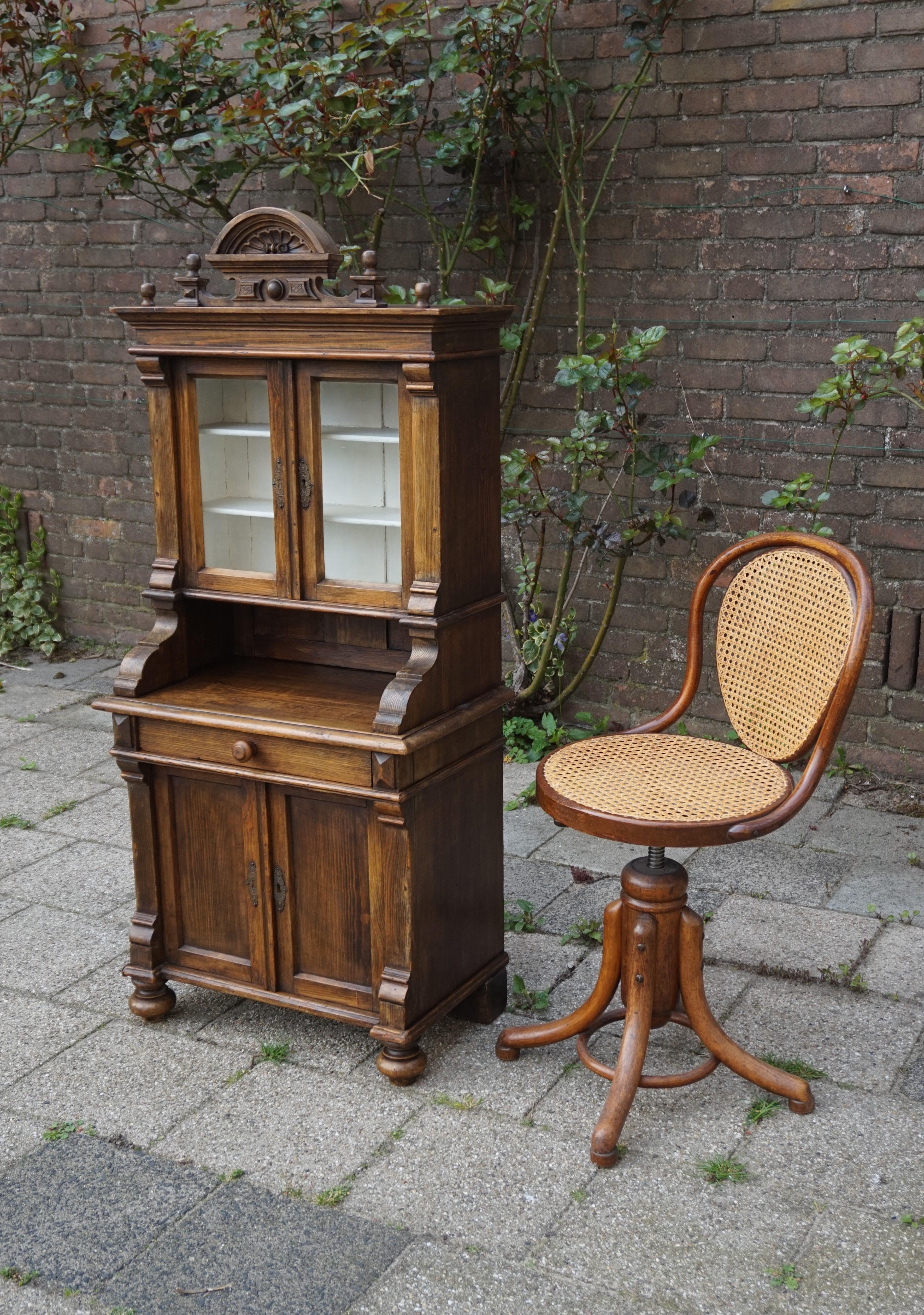 One of a kind, charming and small-size country house cabinet.

This handcrafted, antique cabinet was made for one of two reasons. It was either made as a scale model a sales representative to show to potential buyers or it was an aptitude test for