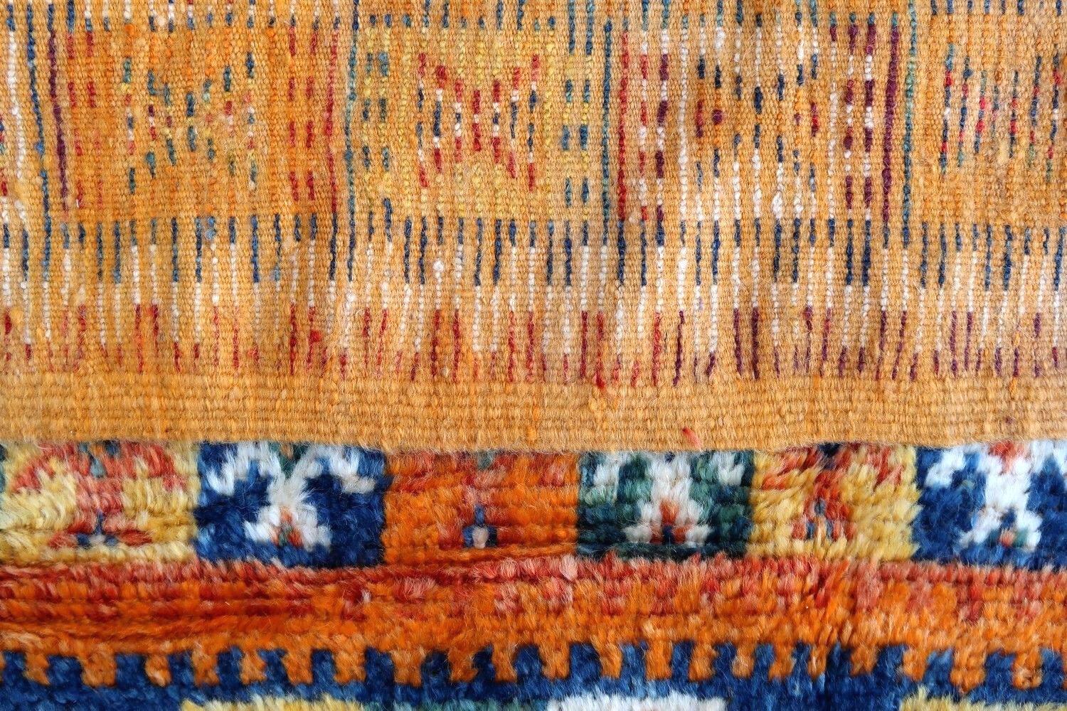 Antique handmade Moroccan rug in original good condition. The rug is from the beginning of 20th century made in wool.

-condition: original good,

-circa: 1900s,

-size: 4.2' x 9.2' (130cm x 280cm),

-material: wool,

-country of origin: