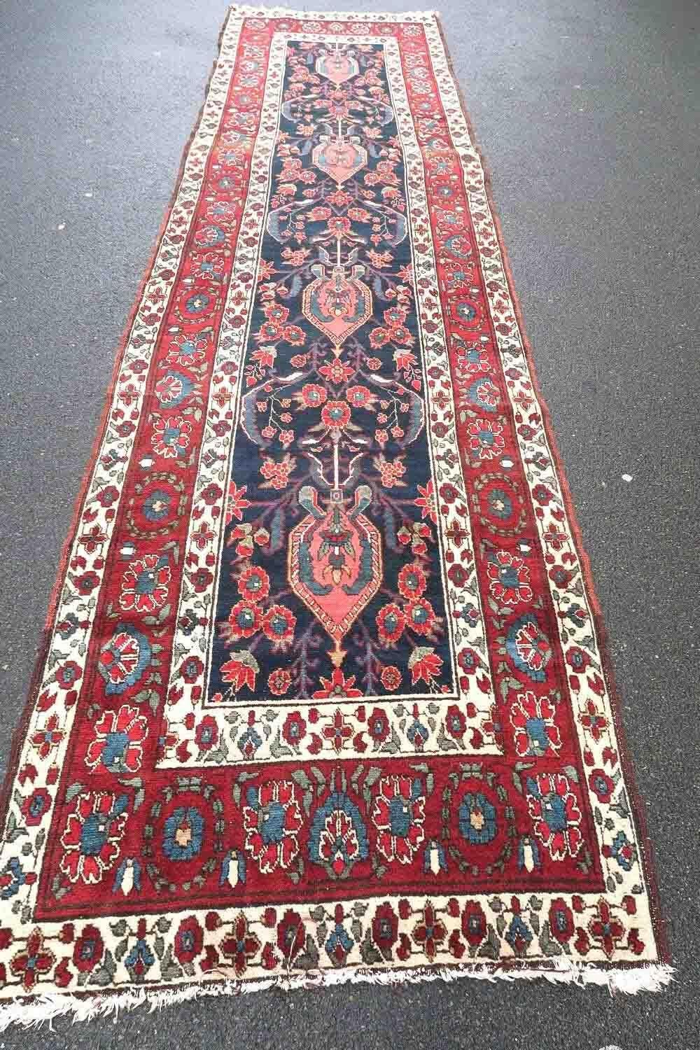 Handmade antique runner from North West in floral design and vegetable dyes. The rug is from the beginning of 20th century in original good condition.

-condition: original good,

-circa: 1900s,

-size: 3.5' x 13.7' (107cm x