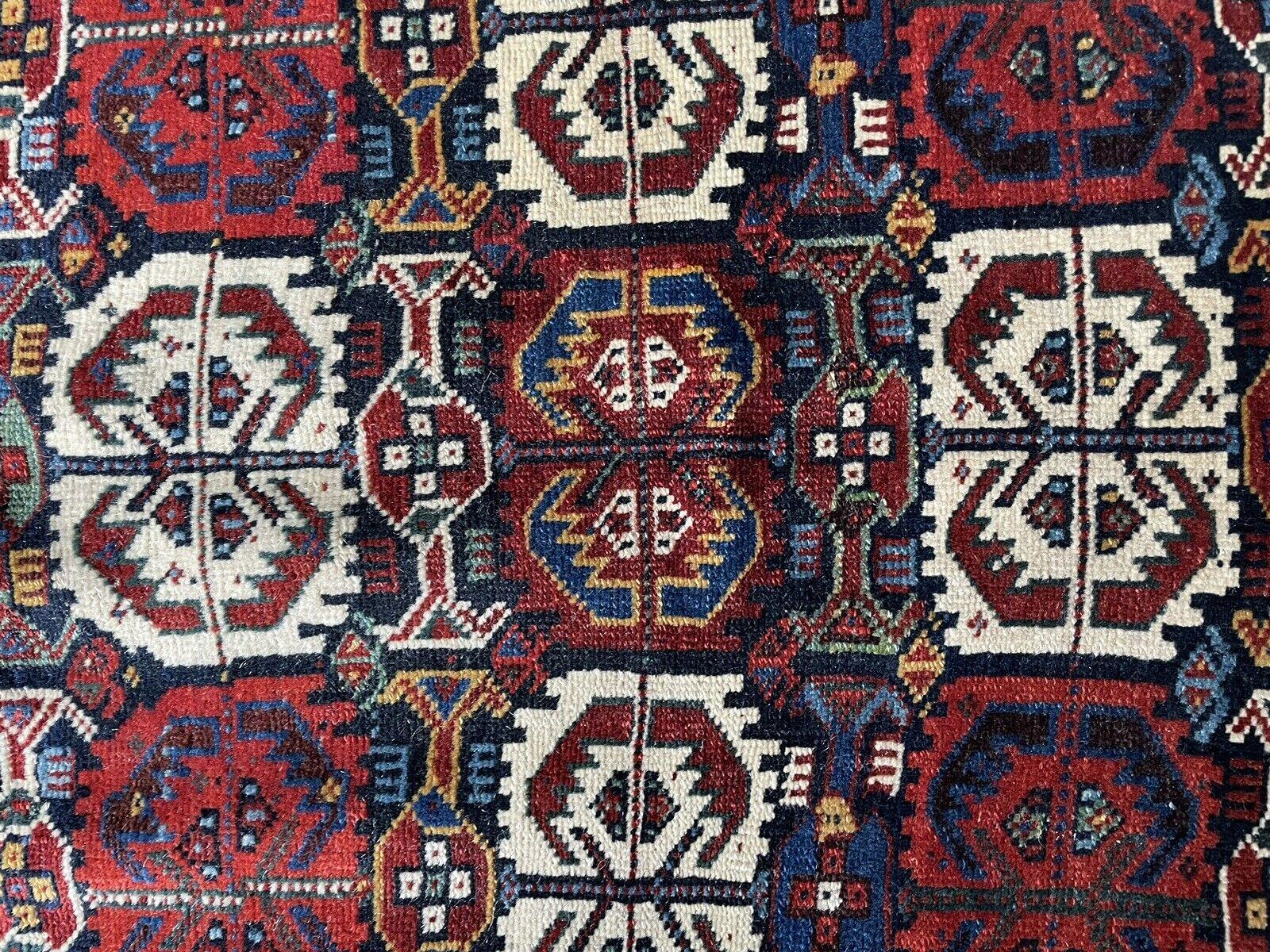 Elevate your collection with this Handmade Antique Persian Collectible Gashkai Bagface, crafted in the 1880s. Measuring 2.2' x 2.7' (70cm x 83cm), this exquisite piece showcases the intricate artistry and vibrant colors typical of Gashkai