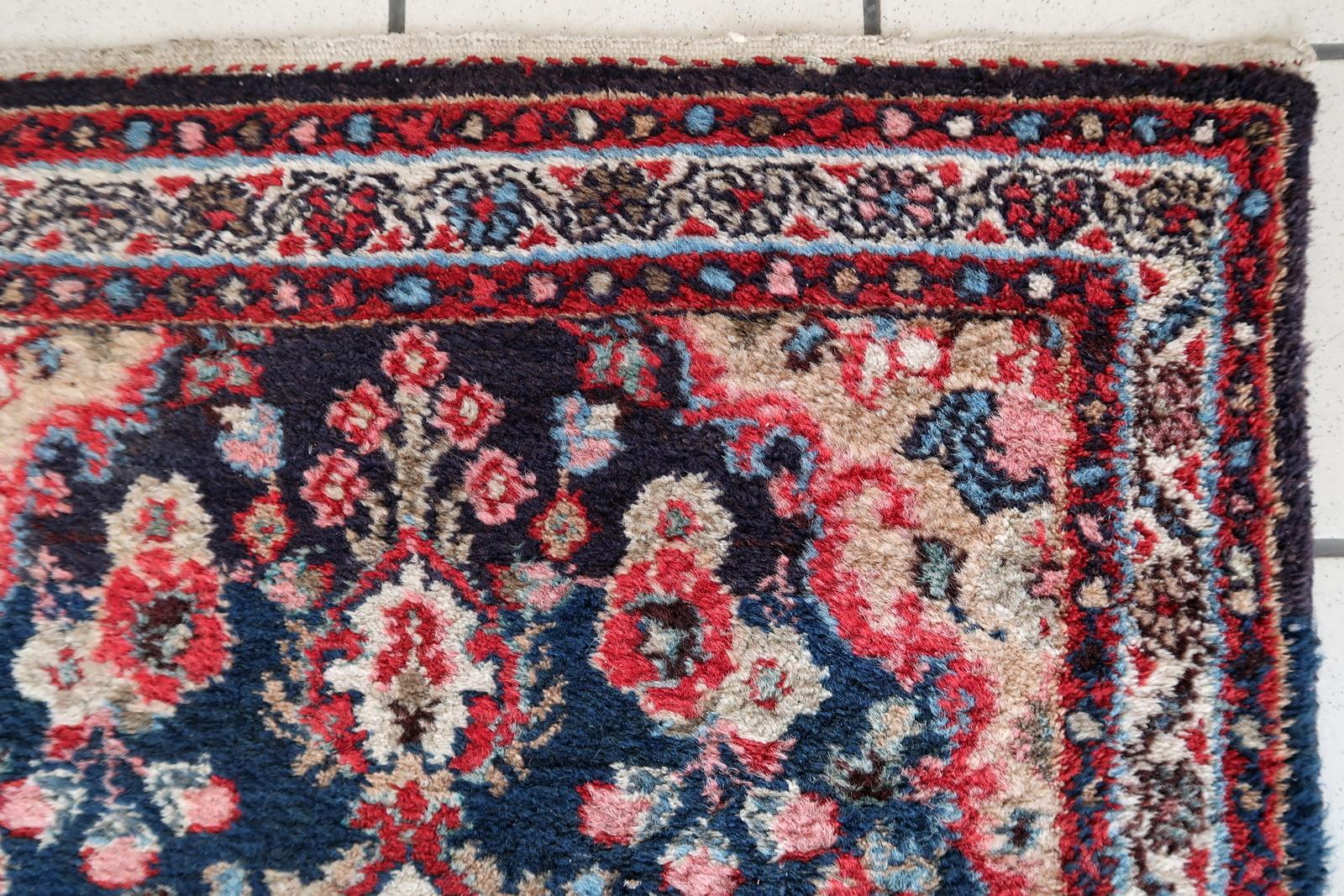 Enhance your living space with the timeless beauty of our Handmade Antique Persian Malayer Rug, a true gem from the 1920s. Measuring 2.3' x 3.4' (71cm x 106cm), this exquisite wool rug boasts original goodness and is in remarkably good condition,