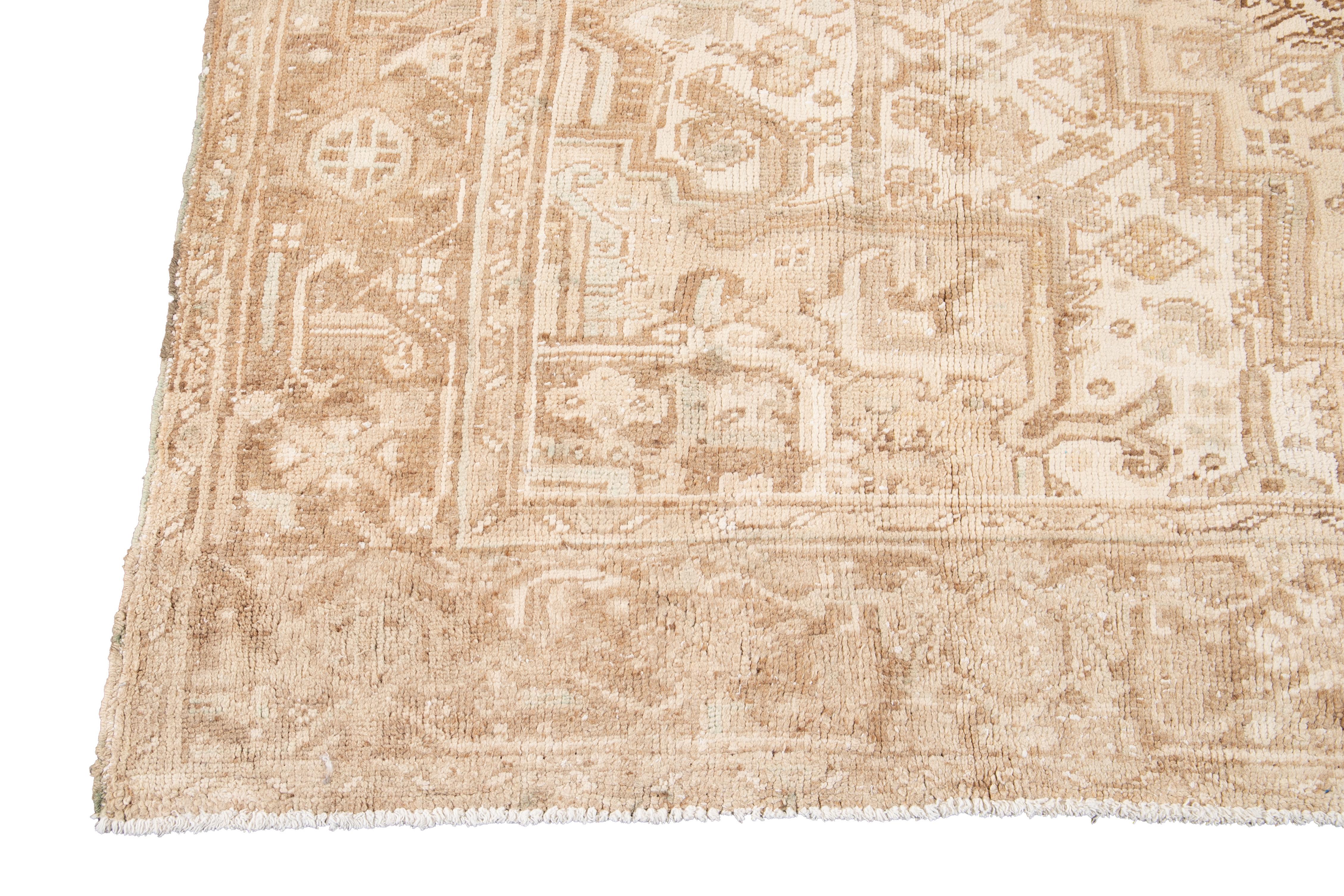 Early 20th Century Handmade Antique Persian Heriz Wool Rug In Beige Allover Motif For Sale