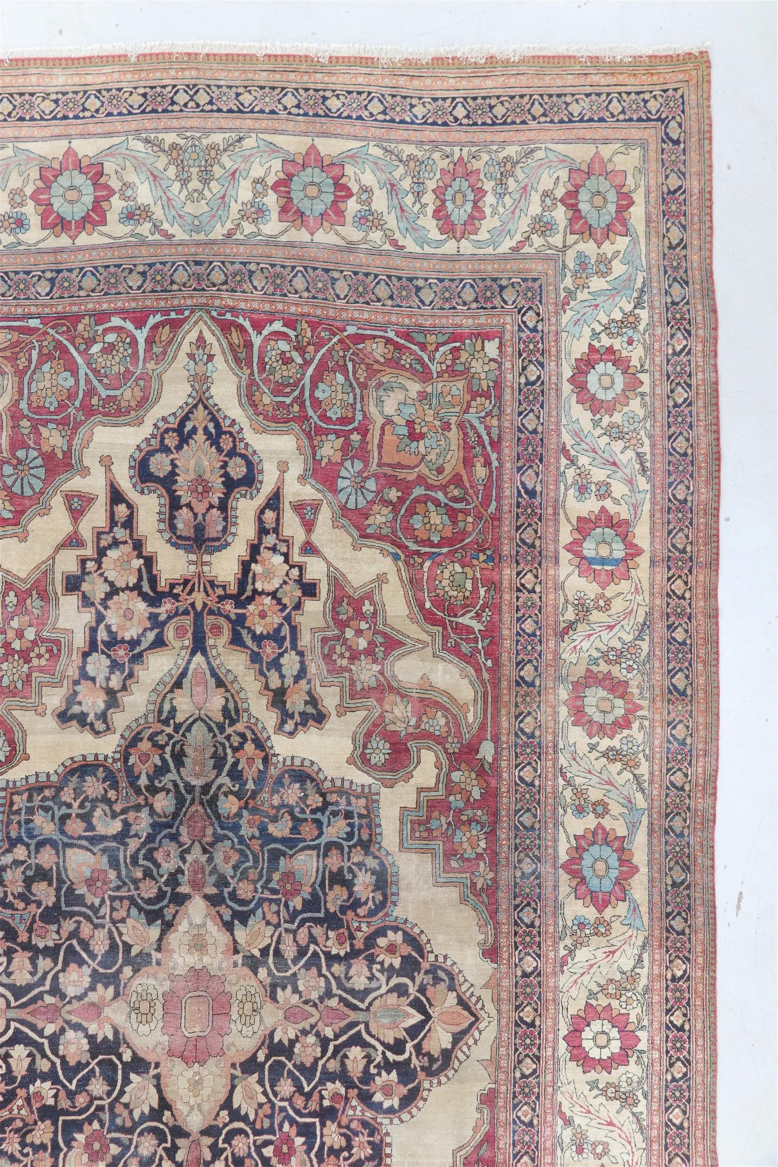 Elevate your space with the grandeur of the past with this exceptional Mansion Size Lavar Kerman Rug, originating from Persia and dating back to circa 1870. With its impressive dimensions measuring 9 feet 4 inches in width and 18 feet 8 inches in