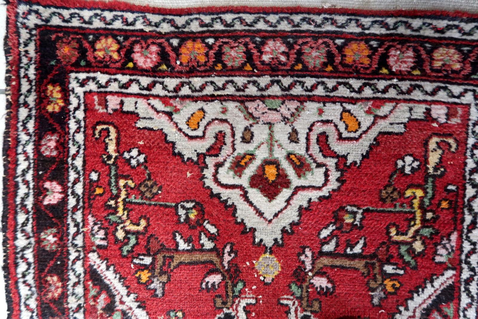 Handmade Antique Persian Malayer Runner Rug:

Design and Craftsmanship:
This narrow and long runner rug, dating back to the 1920s, hails from the Malayer region in Northwest Persia.
Its elongated dimensions of 2.5’ x 12.5’ (or 77cm x 382cm) make it