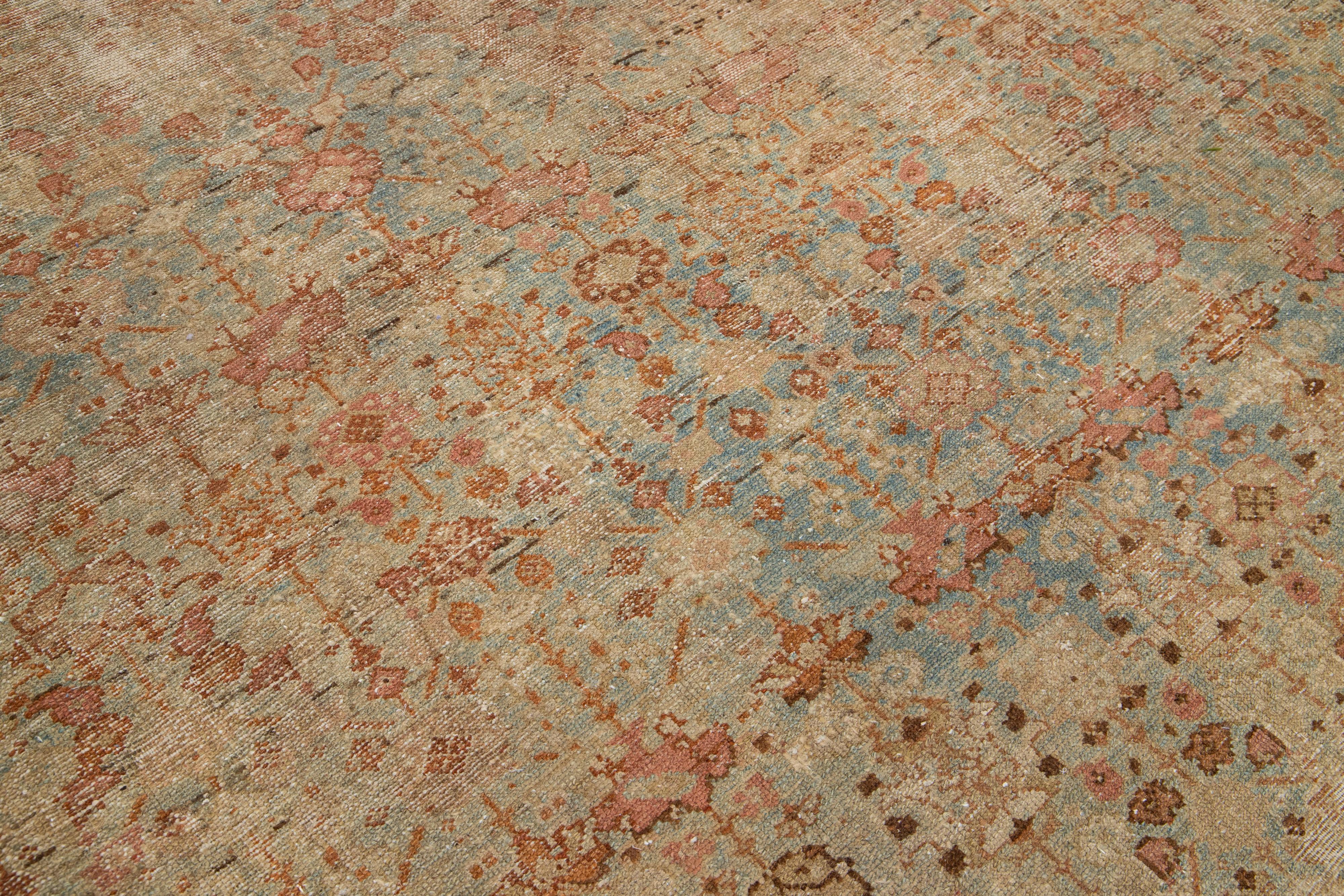 20th Century Handmade Antique Persian Malayer Wool Rug With Floral Motif From the 1920s For Sale