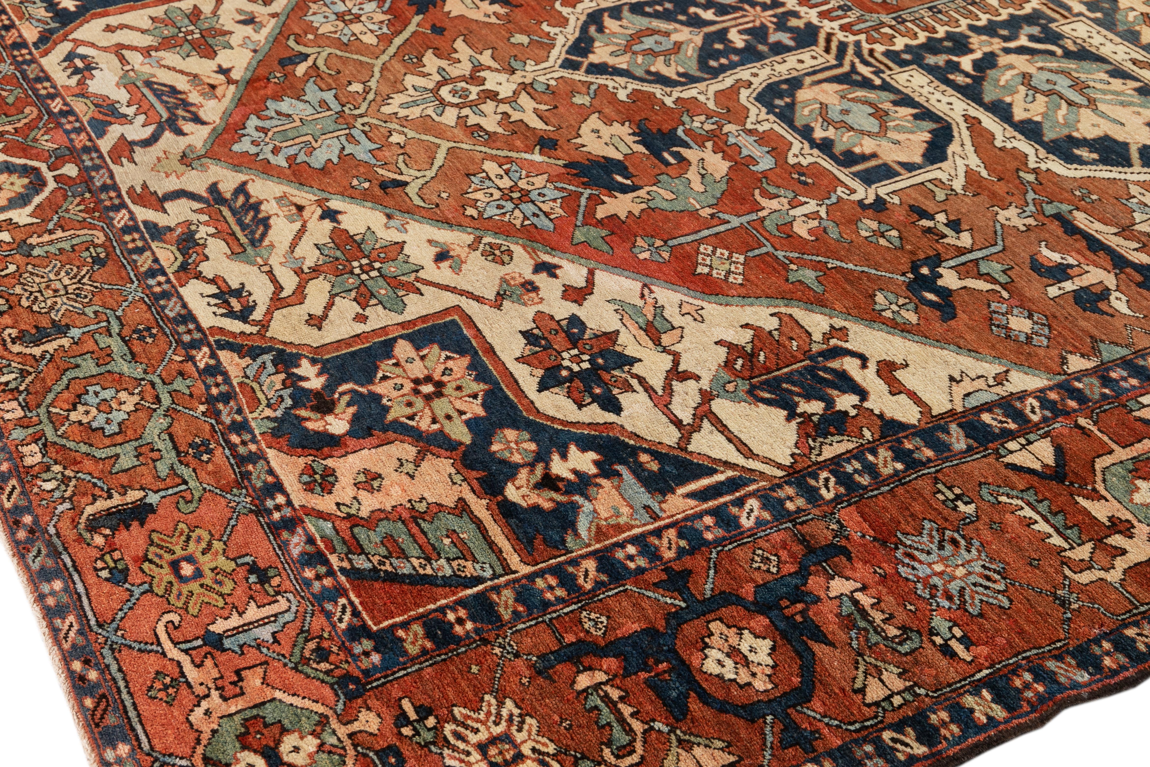 Handmade Antique Persian Serapi Medallion Wool Rug In Orange- Rust Color  In Good Condition For Sale In Norwalk, CT