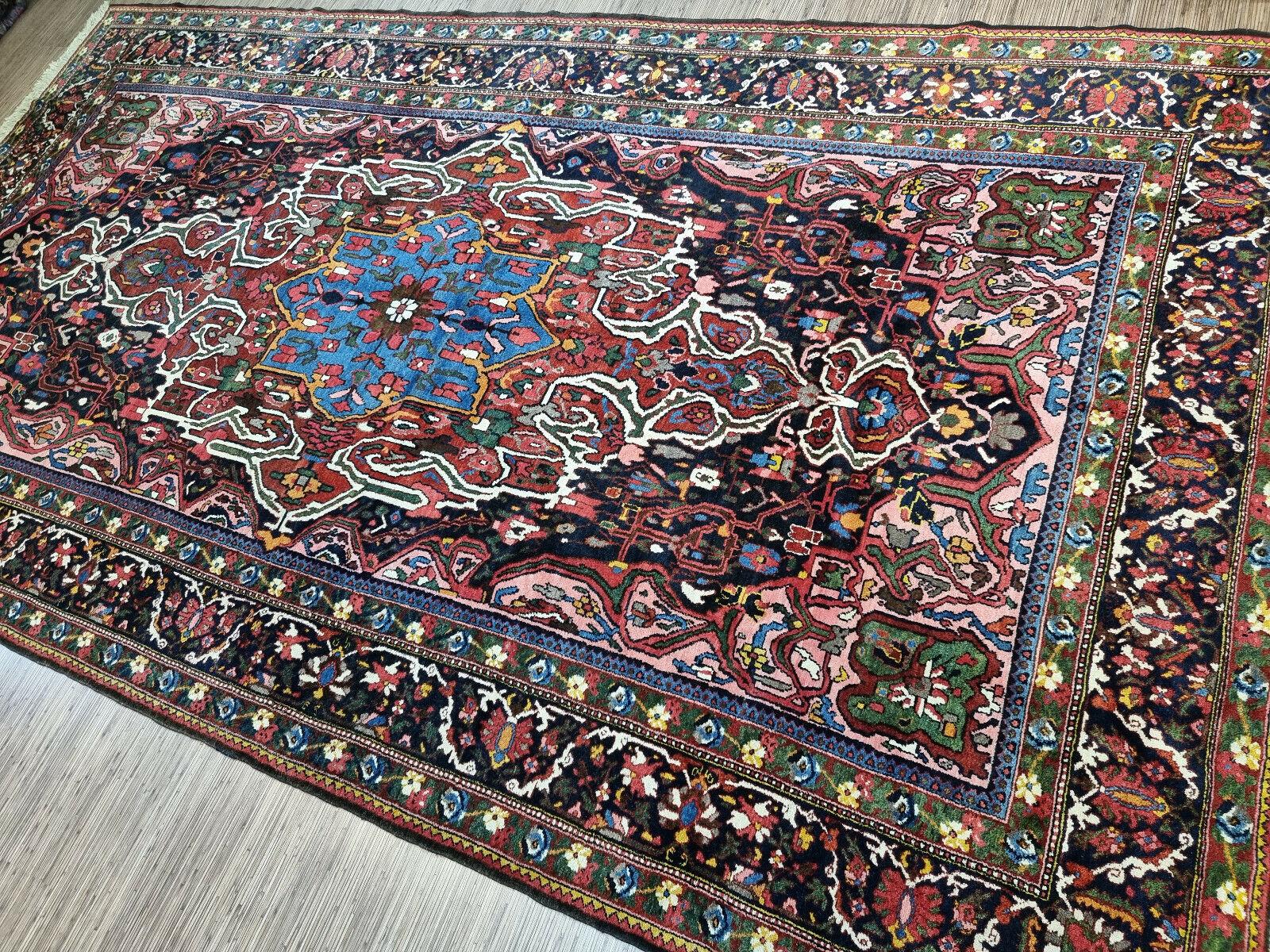 Handmade Antique Persian Style Bakhtiari Rug

Add a touch of history and artistry to your home with this stunning handmade antique Persian style Bakhtiari rug. This exquisite piece measures 7.2’ x 13.2’ and dates back to the 1920s, but is still in
