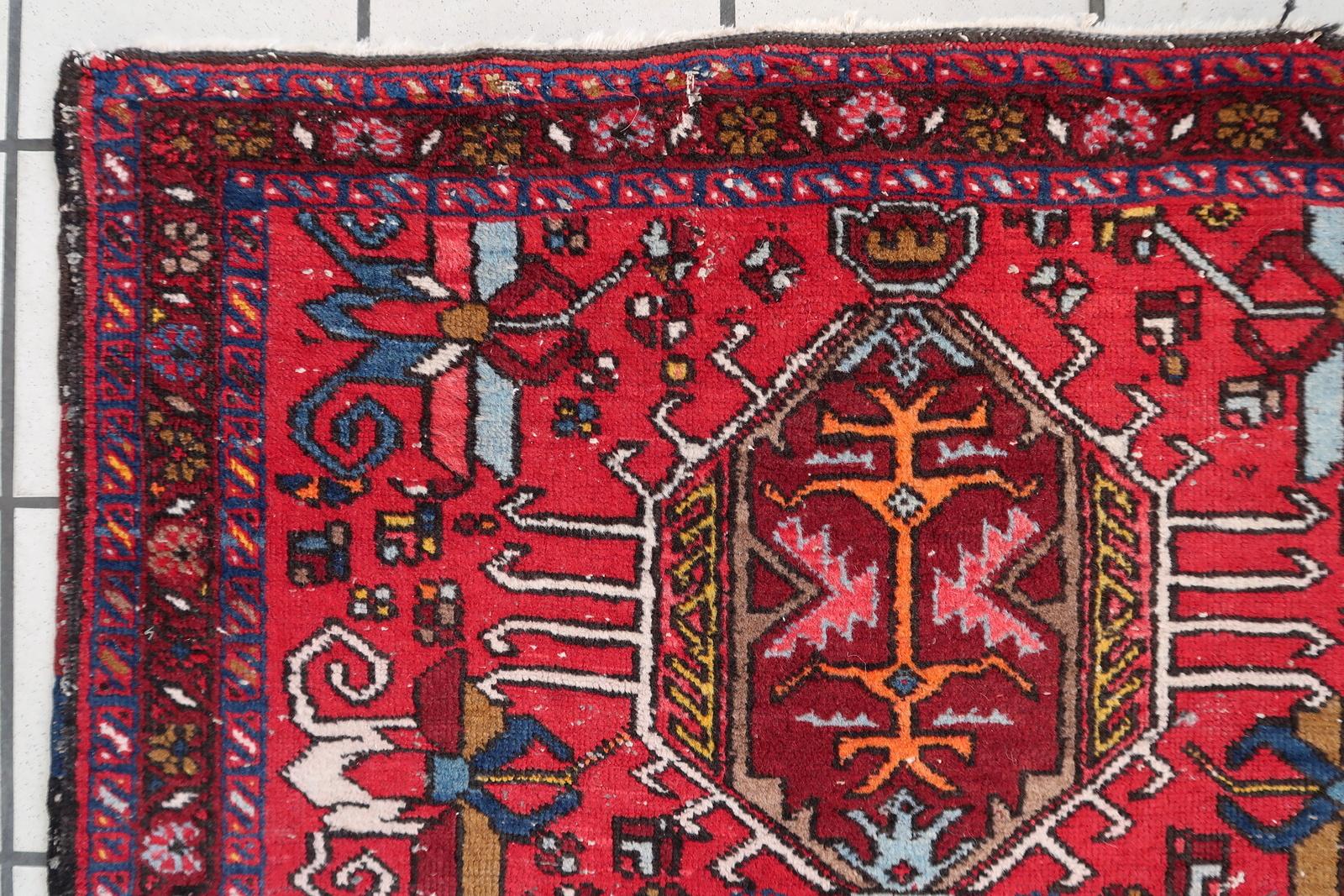 Handmade Antique Persian Style Karajeh Rug from the 1920s:

Dimensions:
Size: 2.9’ x 4.6’ (90cm x 143cm)
Shape: Rectangular
Material and Condition:
Crafted from wool, this rug ensures both durability and a soft feel underfoot.
Despite showing some