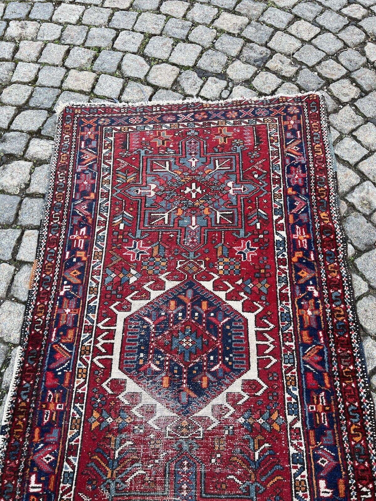 Handmade Antique Persian Style Karajeh Runner Rug
Overview:
Introducing our exquisite Handmade Antique Persian Style Karajeh Runner Rug, a true testament to timeless elegance and craftsmanship. This authentic piece hails from the 1920s, carrying