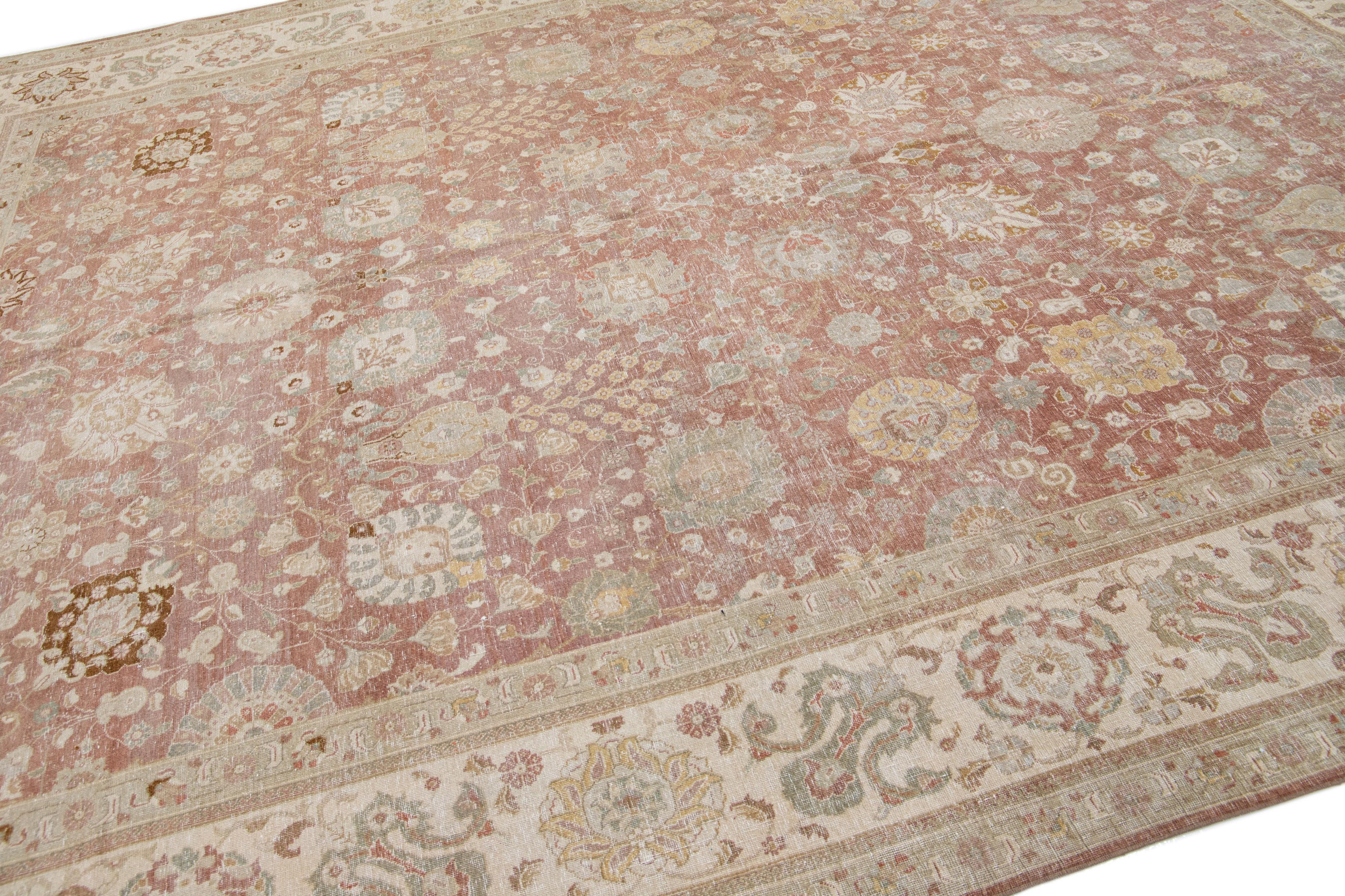 Hand-Knotted Handmade Antique Persian Tabriz Rust Wool Rug with Floral Design For Sale