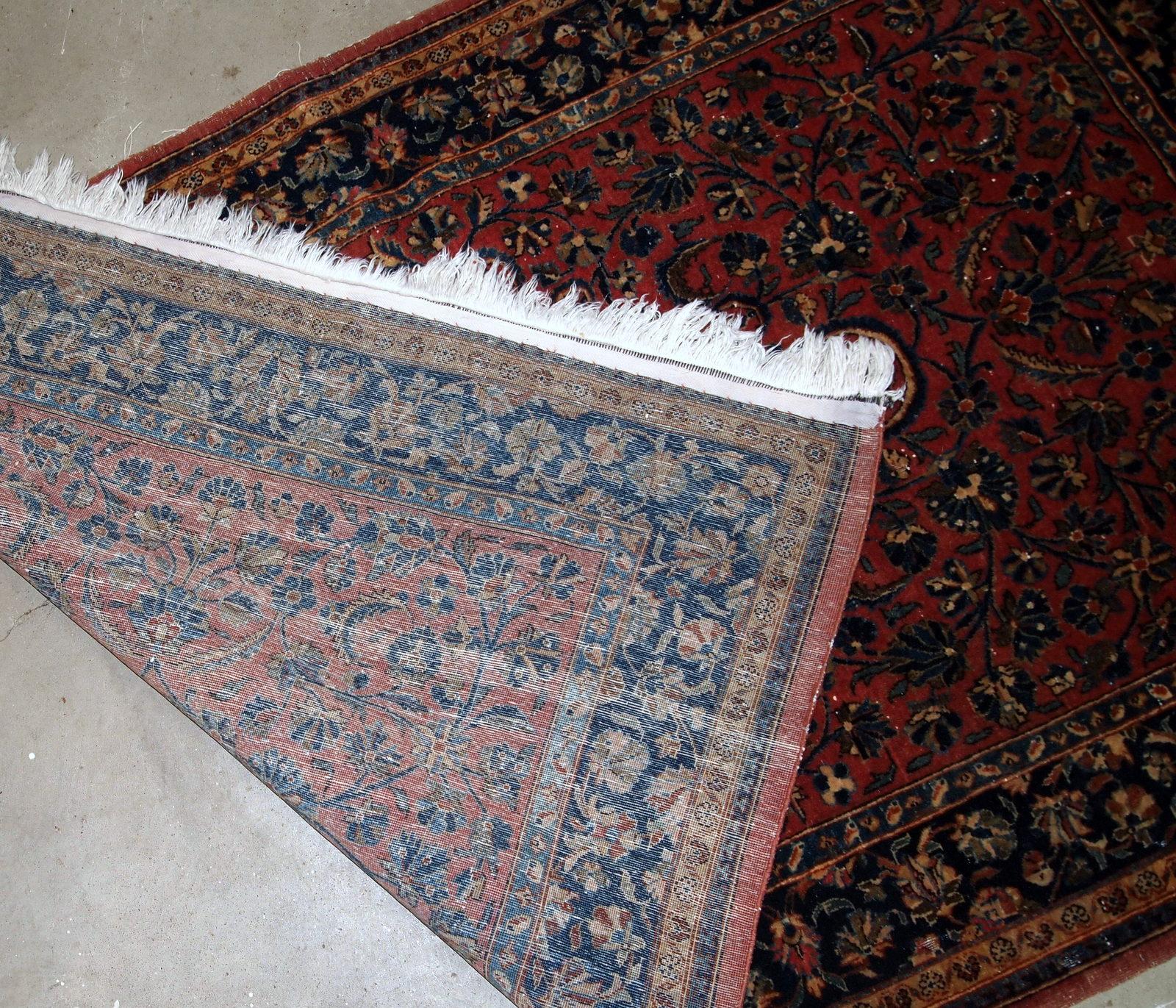Handmade antique Sarouk style rug in original good condition. The rug is from the beginning of 20th century made in Traditional design.

- Condition: Original good,

- circa 1920s,

- Size: 3.3' x 5.3' (100cm x 161cm),

- Material: