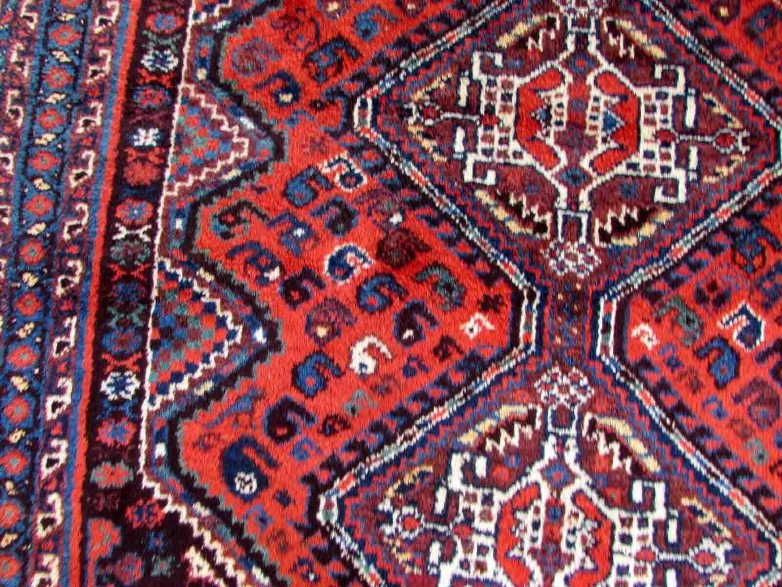Handmade antique Shiraz rug in traditional medallion design. The rug is from the beginning of 20th century in original good condition.

Condition: original good,

circa 1910s

Size: 3.8' x 5' (116cm x 155cm),

material: wool,

country of