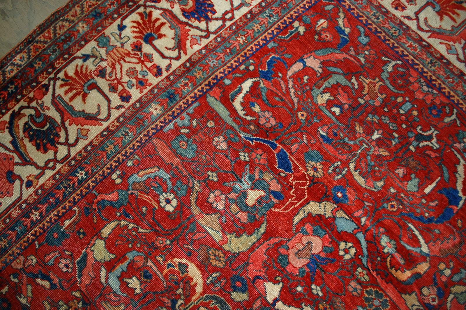 Handmade antique Sultanabad rug in good condition, it is from the end of 19th century. This rug made in red and beige wool. Measures: 9.10' x 13' (303cm x 396cm).
