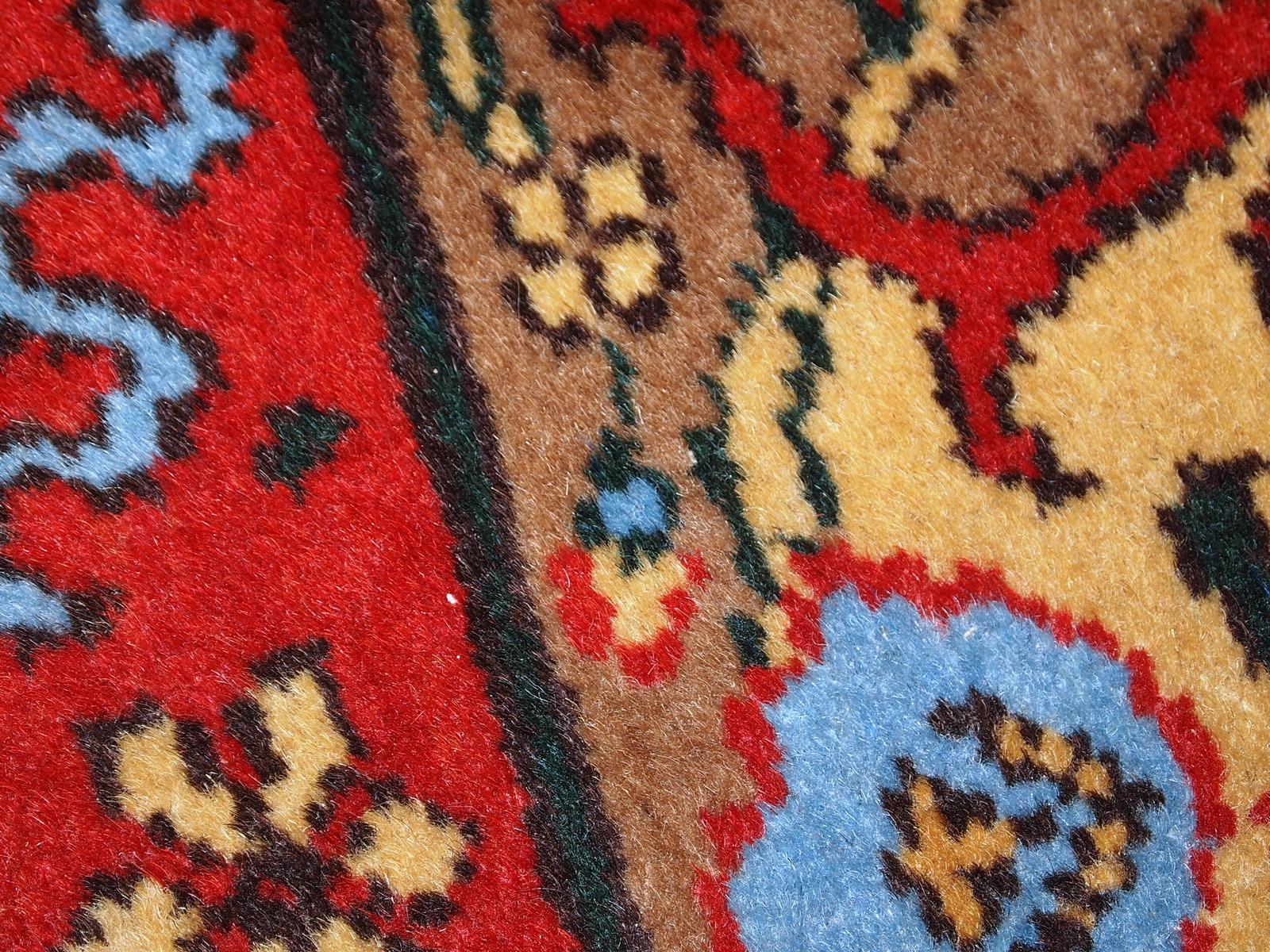 Vintage Tabriz rug in original good condition with Traditional Design.
 