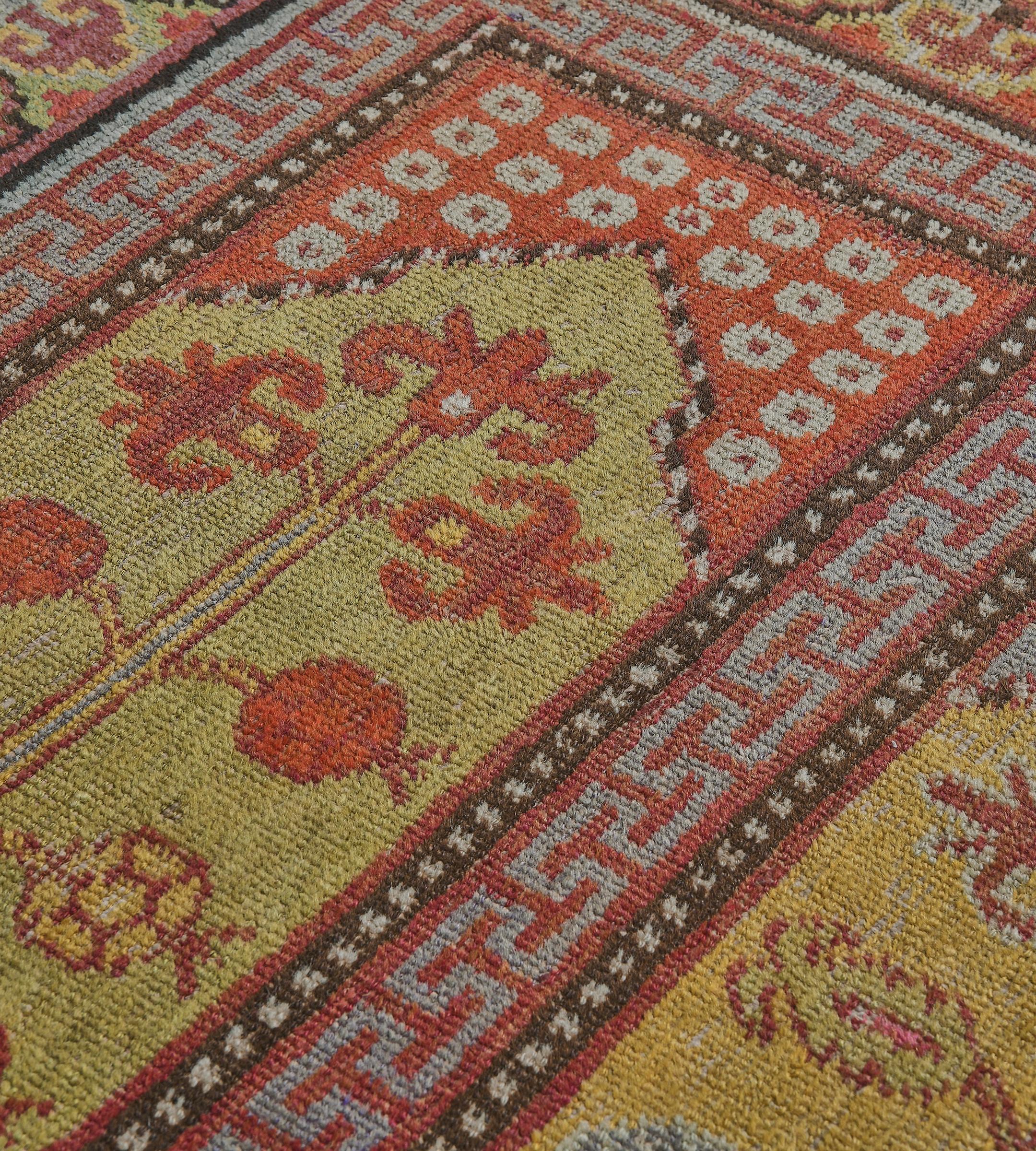 19th Century Handmade Antique Traditional Woool Red Khotan Runner Wall Hanging For Sale