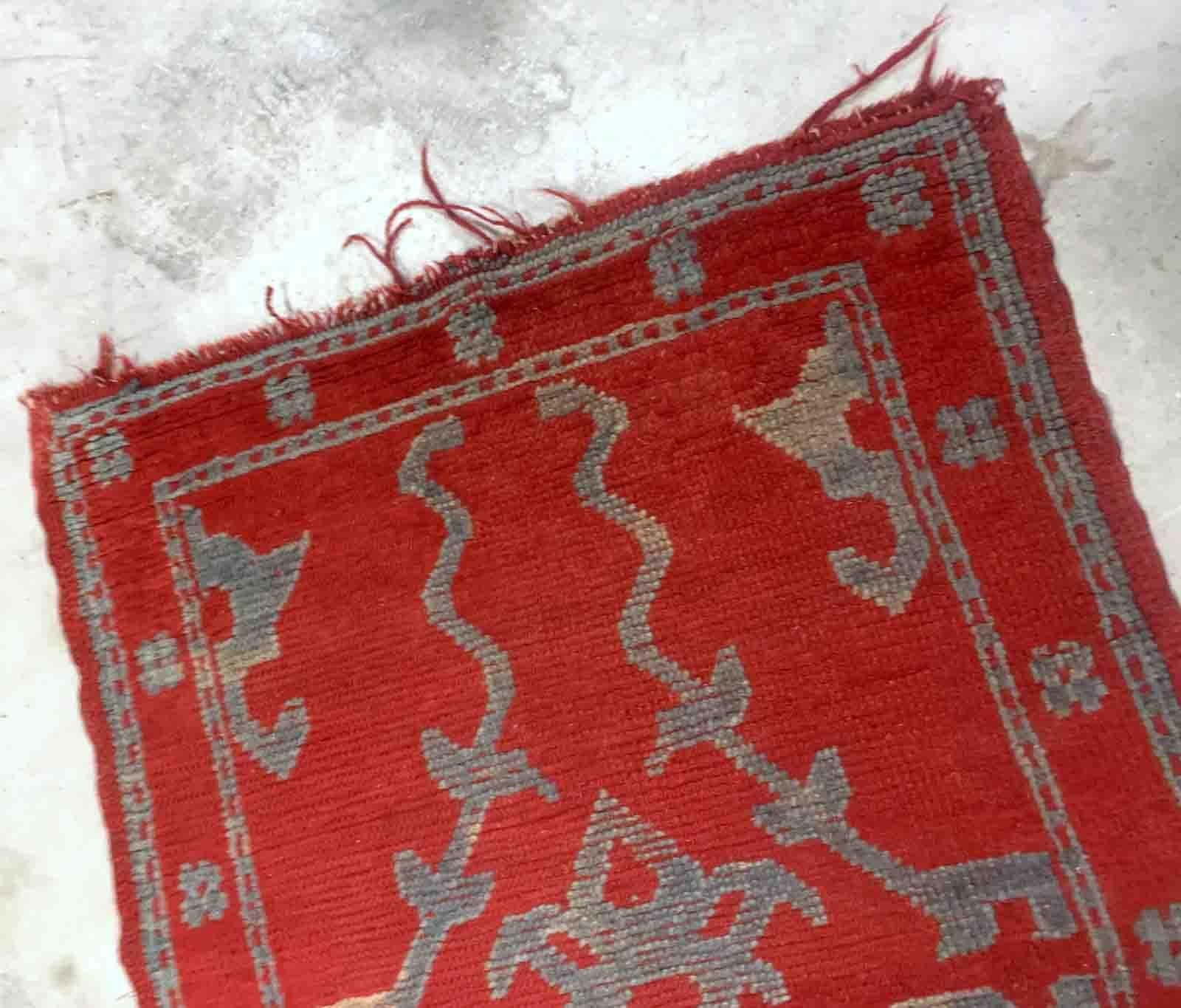 Handmade antique Turkish red rug from Oushak region. The rug is from the end of 19th century in original condition, it has some signs of age.

-condition: original, some signs of age,

-circa: 1880s,

-size: 3' x 4.9' (91cm x