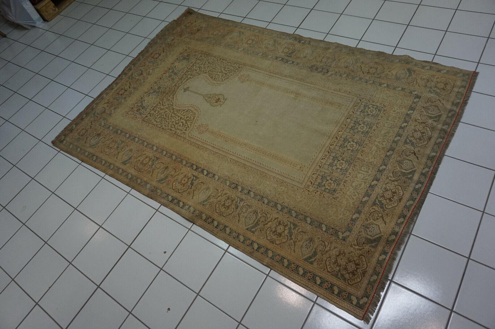 Handmade Antique Turkish Transilvania Prayer Rug
Embrace the rich history and cultural heritage with our Handmade Antique Turkish Transilvania Prayer Rug. Dating back to the 1880s, this collectible piece carries the essence of time and tradition.